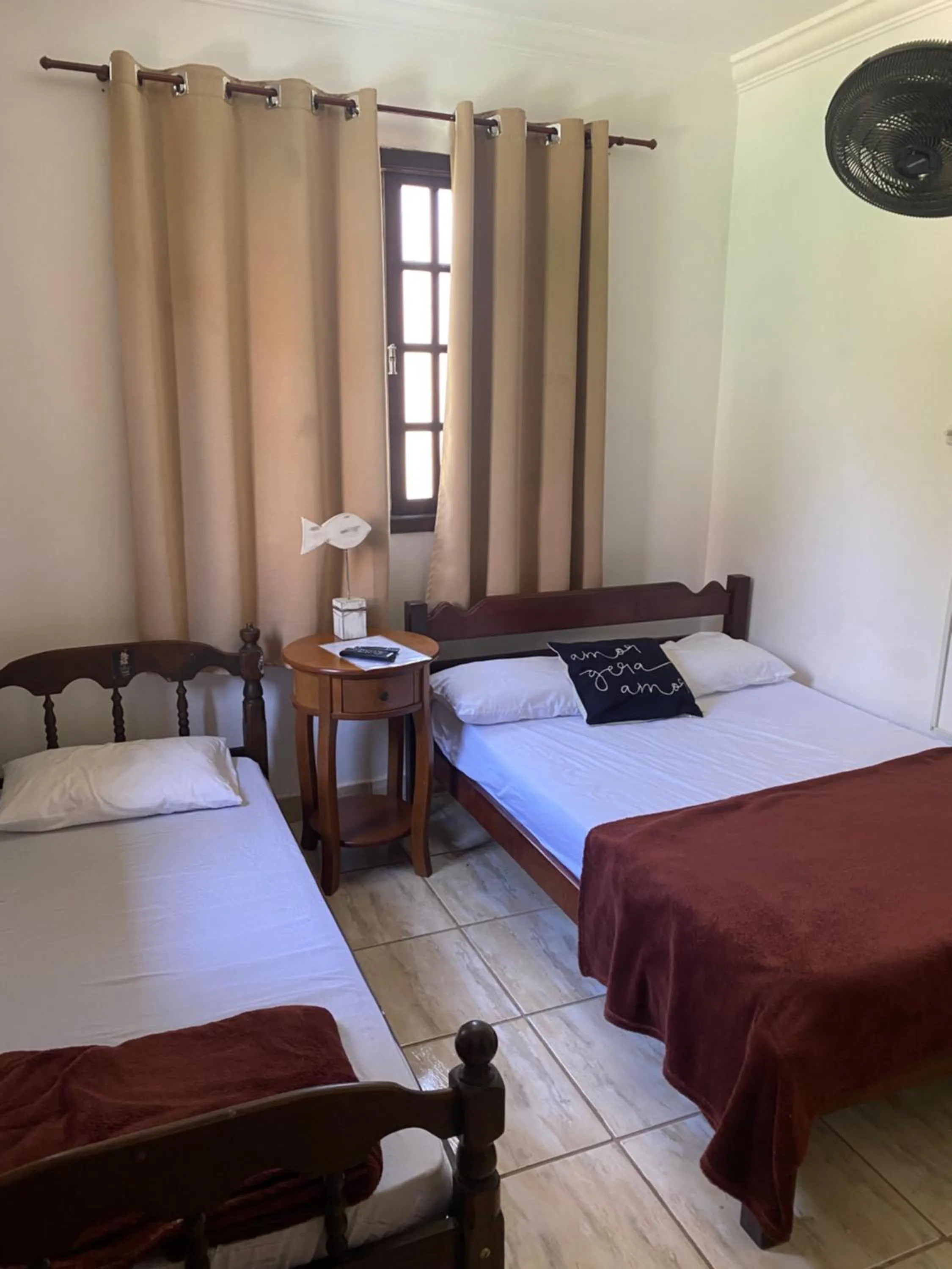 Bed in Pousada Casa de mãe aconchegante com piscina próximo à praia