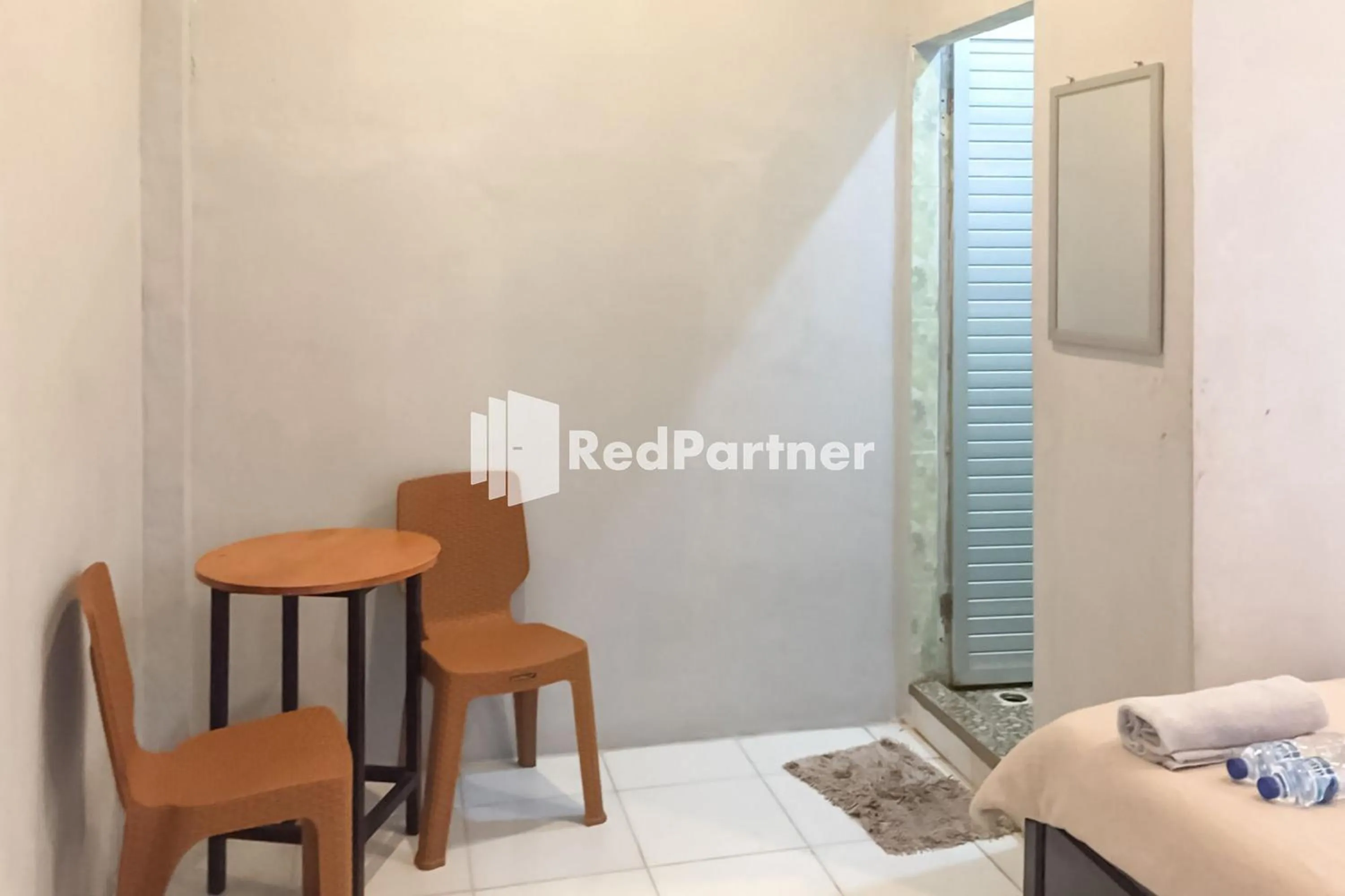 Bedroom in Aquino Marito Homestay Mitra RedDoorz