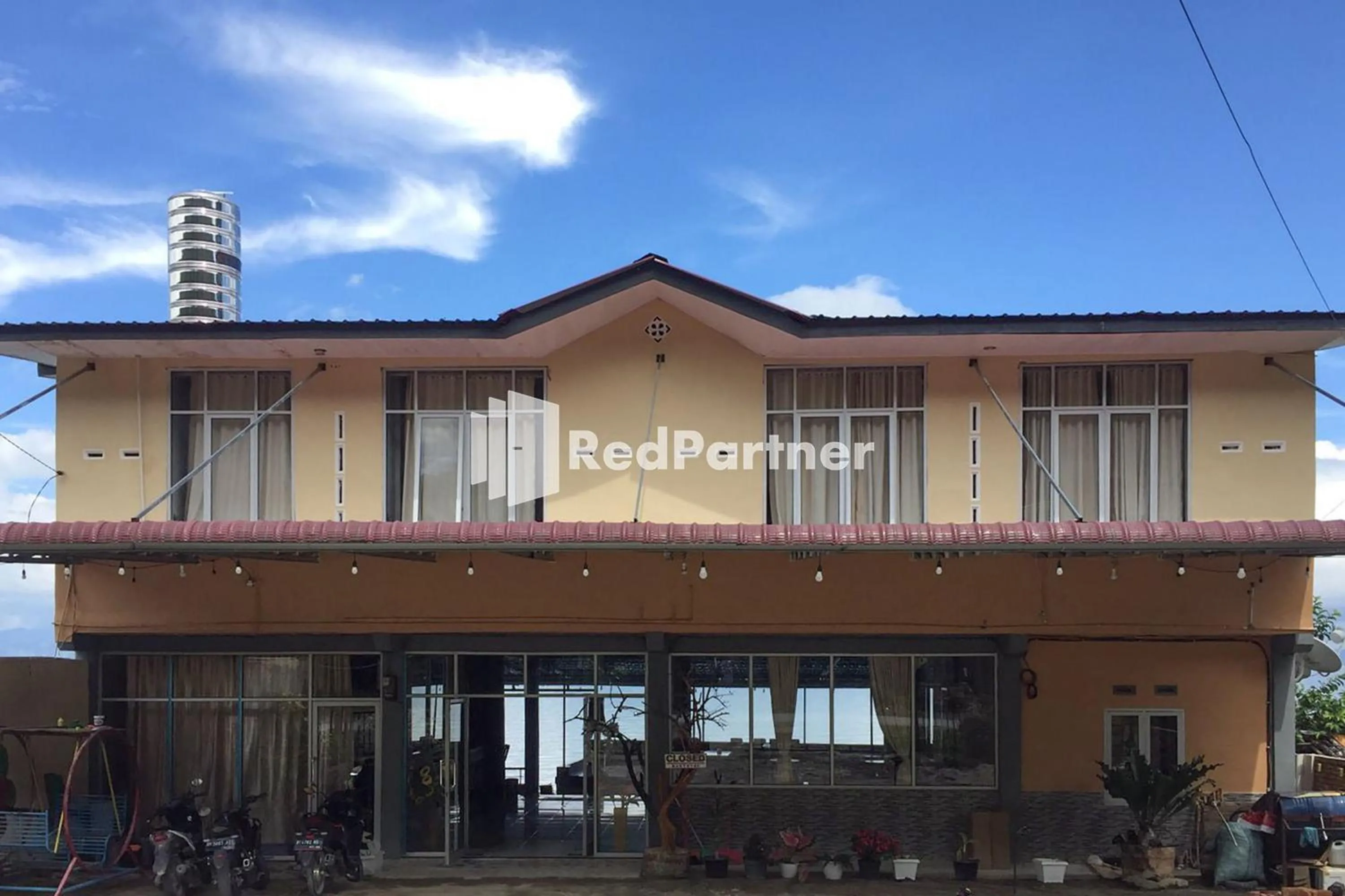 Property building in Aquino Marito Homestay Mitra RedDoorz