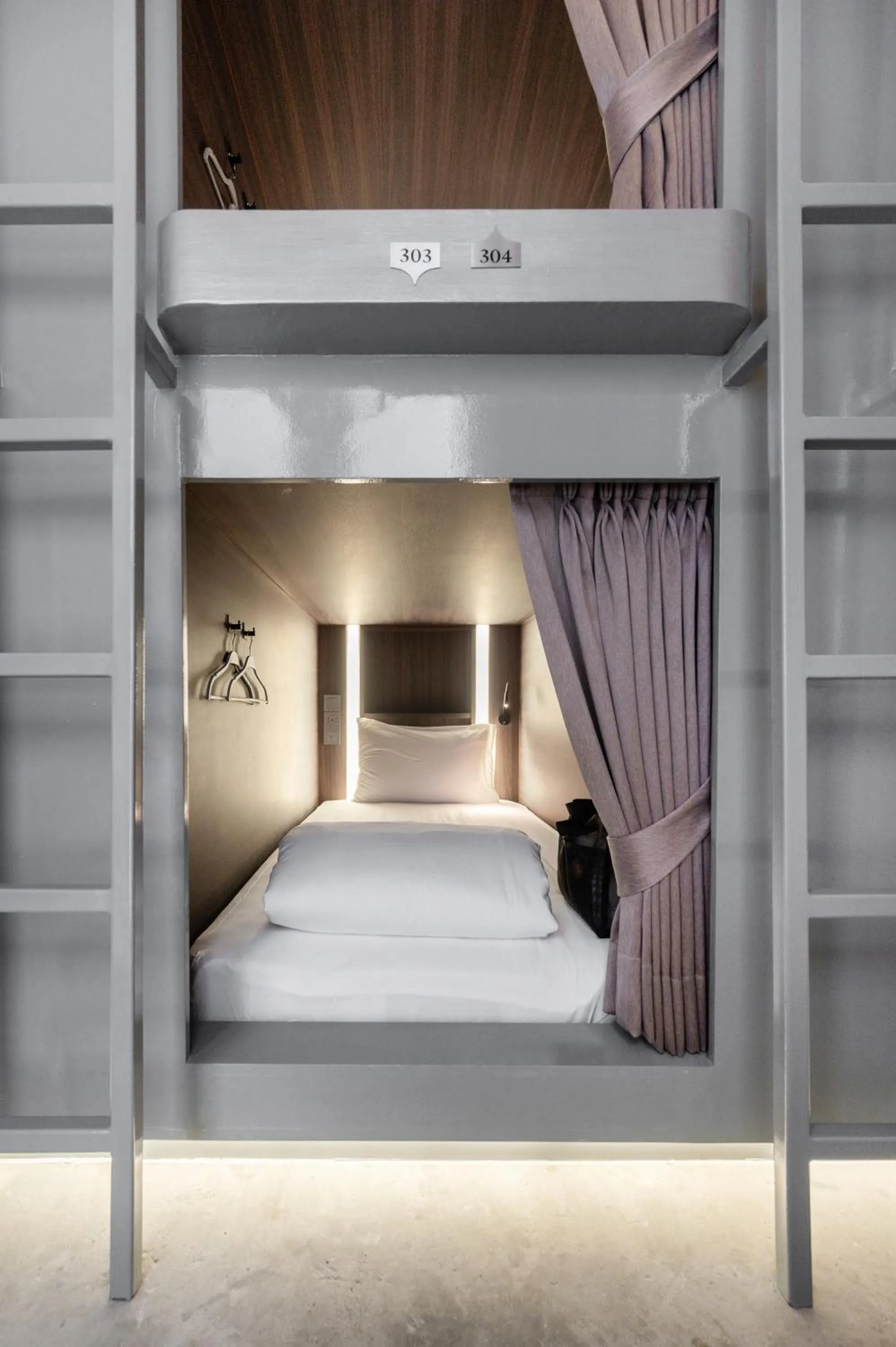 Bed in Nidhra Boutique Hotel Bangkok Sukhumvit