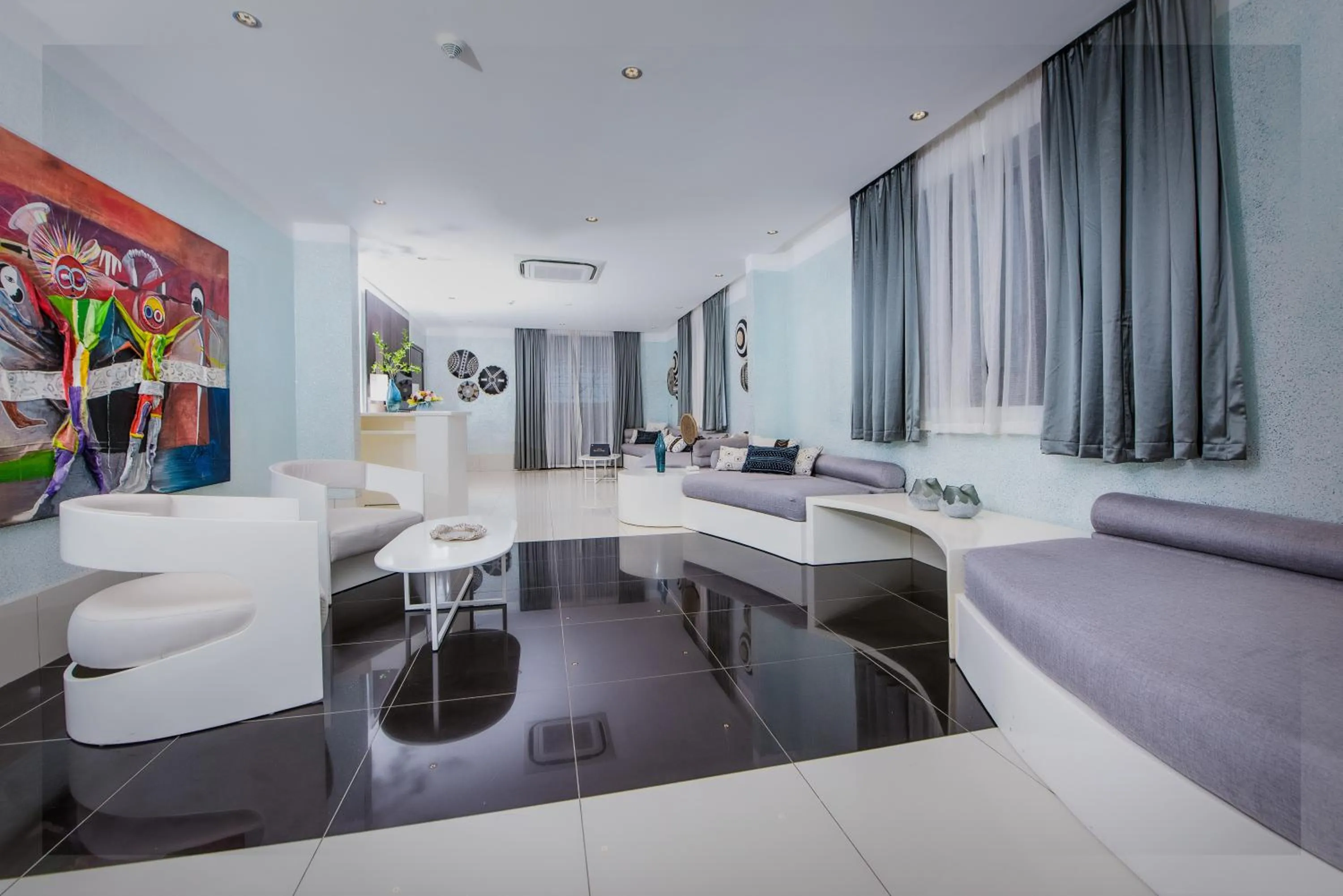 Communal lounge/ TV room in Krystal Palace Douala