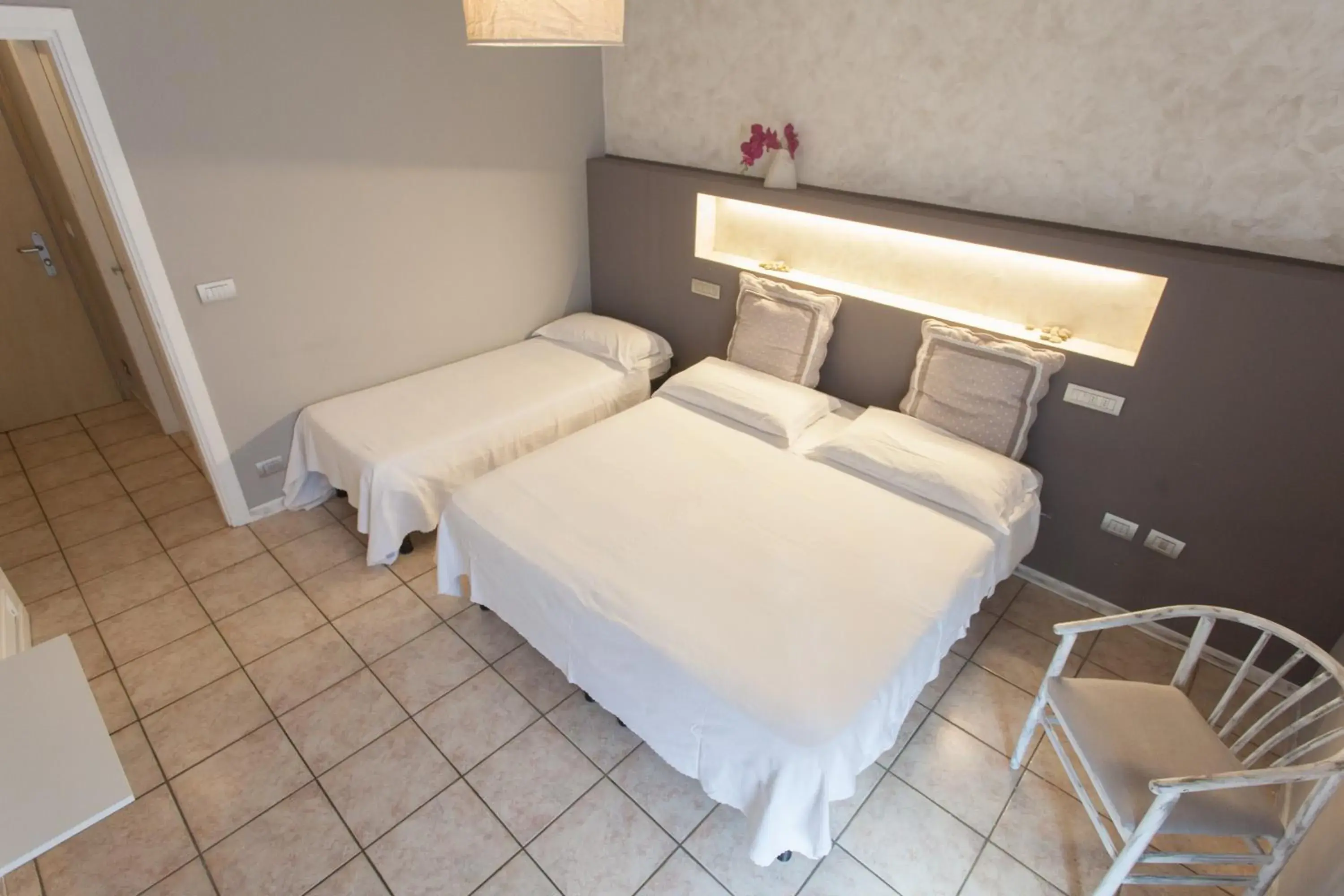 Triple Room in Hotel Roma Triple Room in Hotel Roma