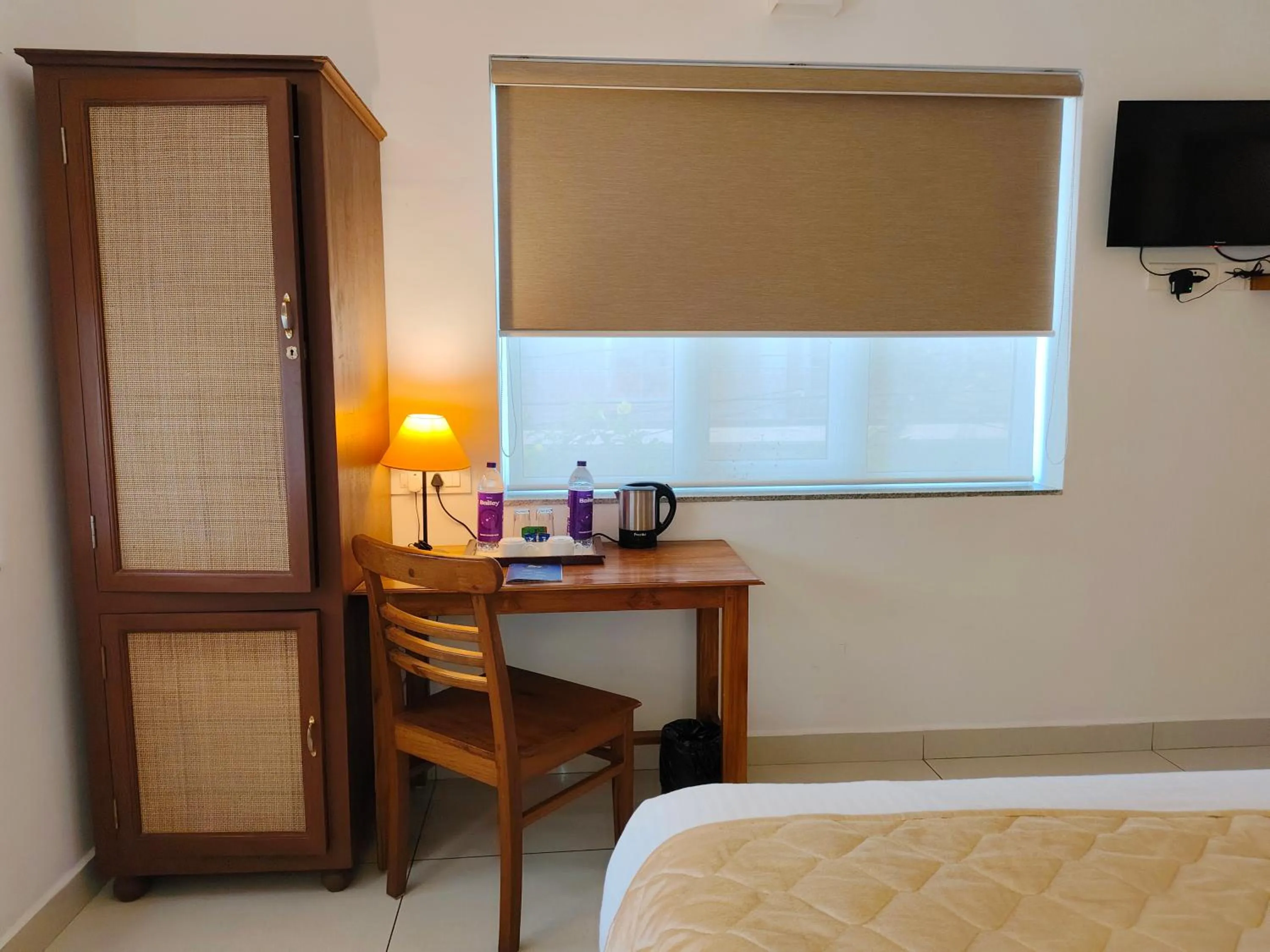 Bed in Hotel Aura by Woco Stays