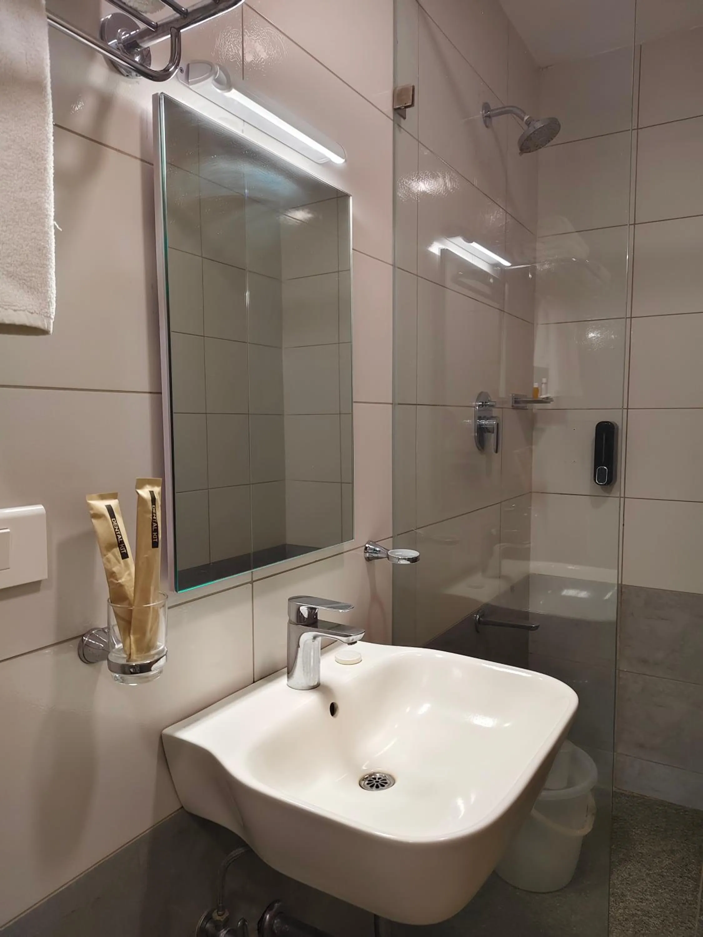 Toilet in Hotel Aura by Woco Stays