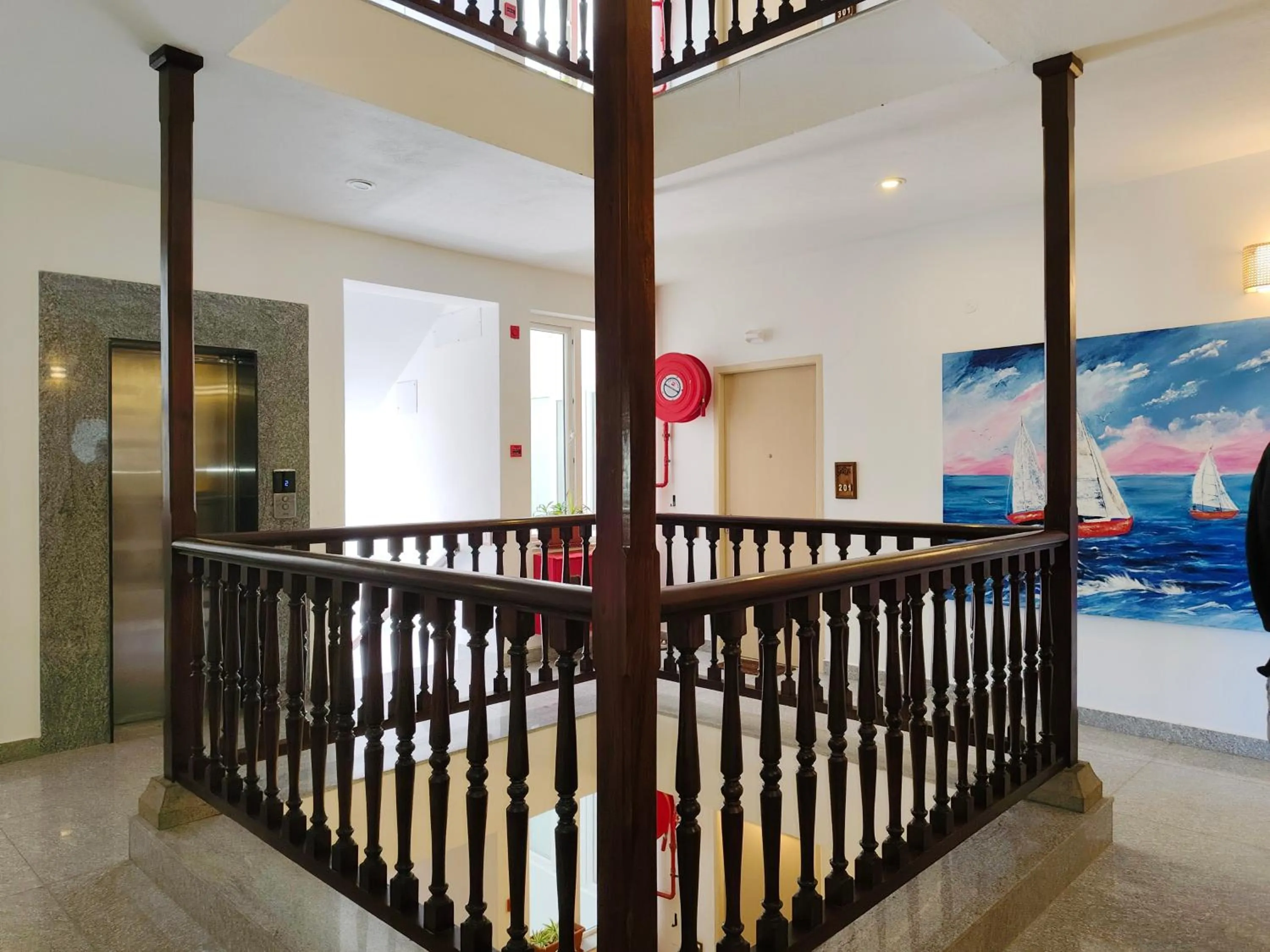 Property building in Hotel Aura by Woco Stays