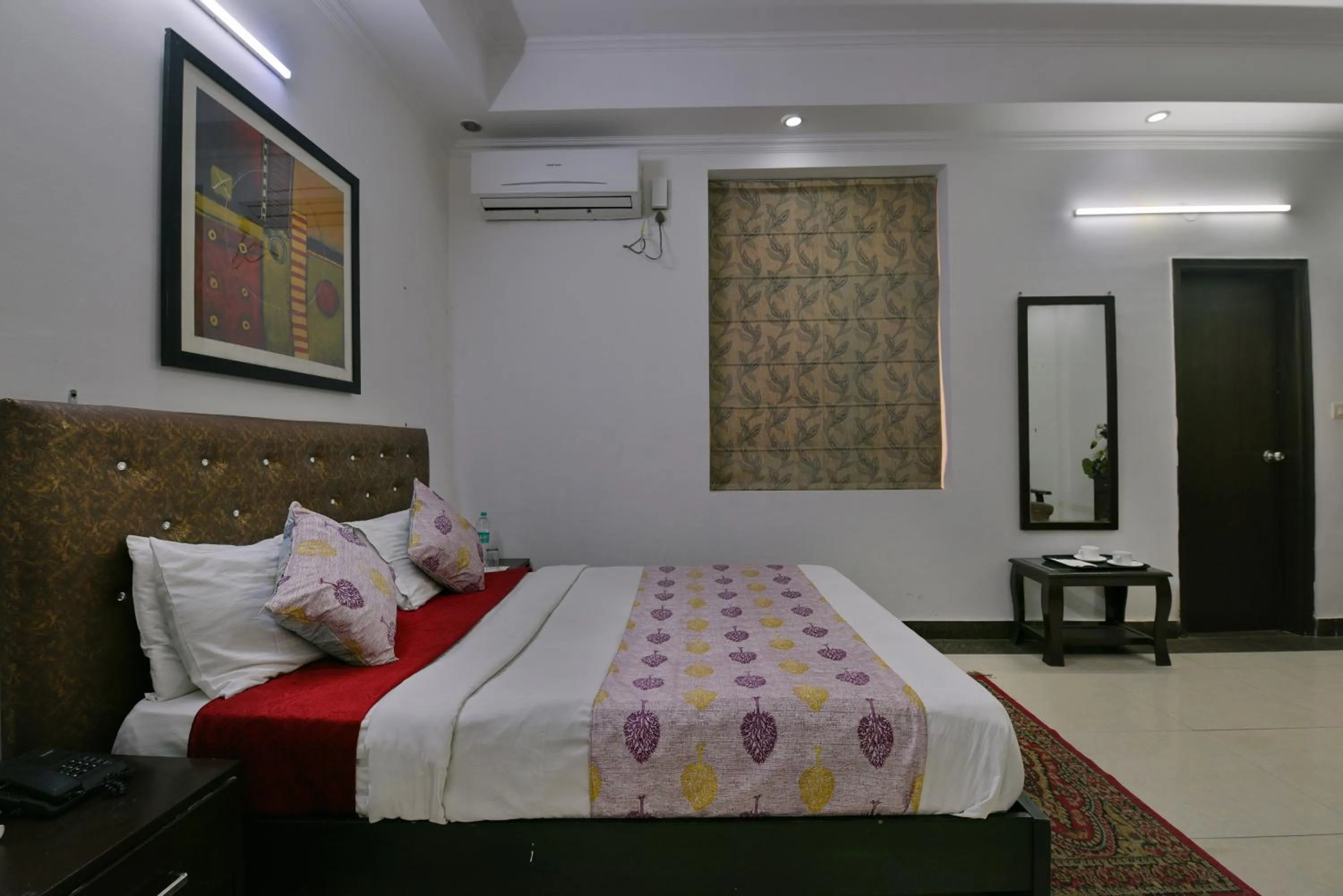 Bed in Hotel Diamond Stays