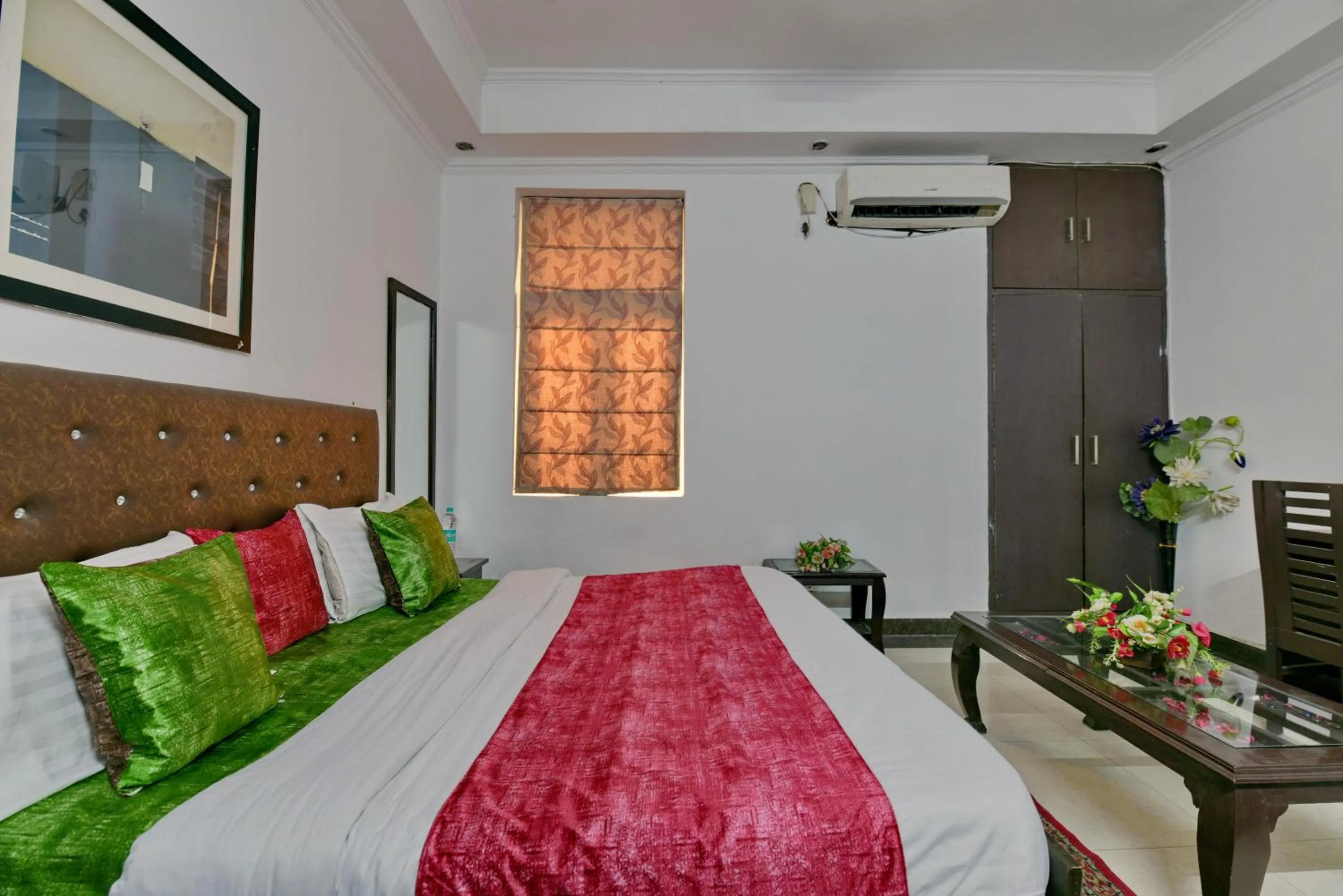 Bed in Hotel Diamond Stays