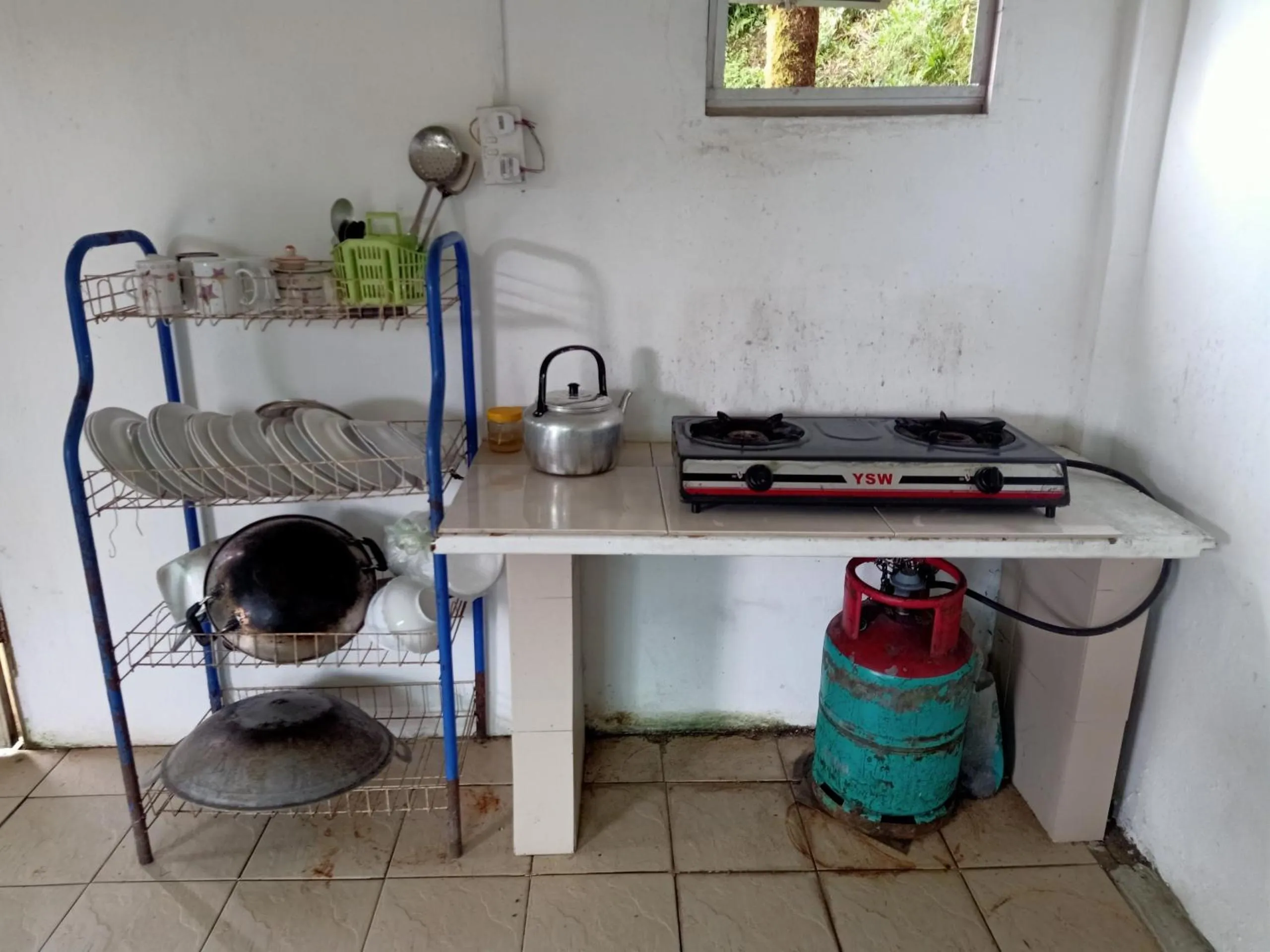Kitchen or kitchenette in Hotel O Mountain Resthouse