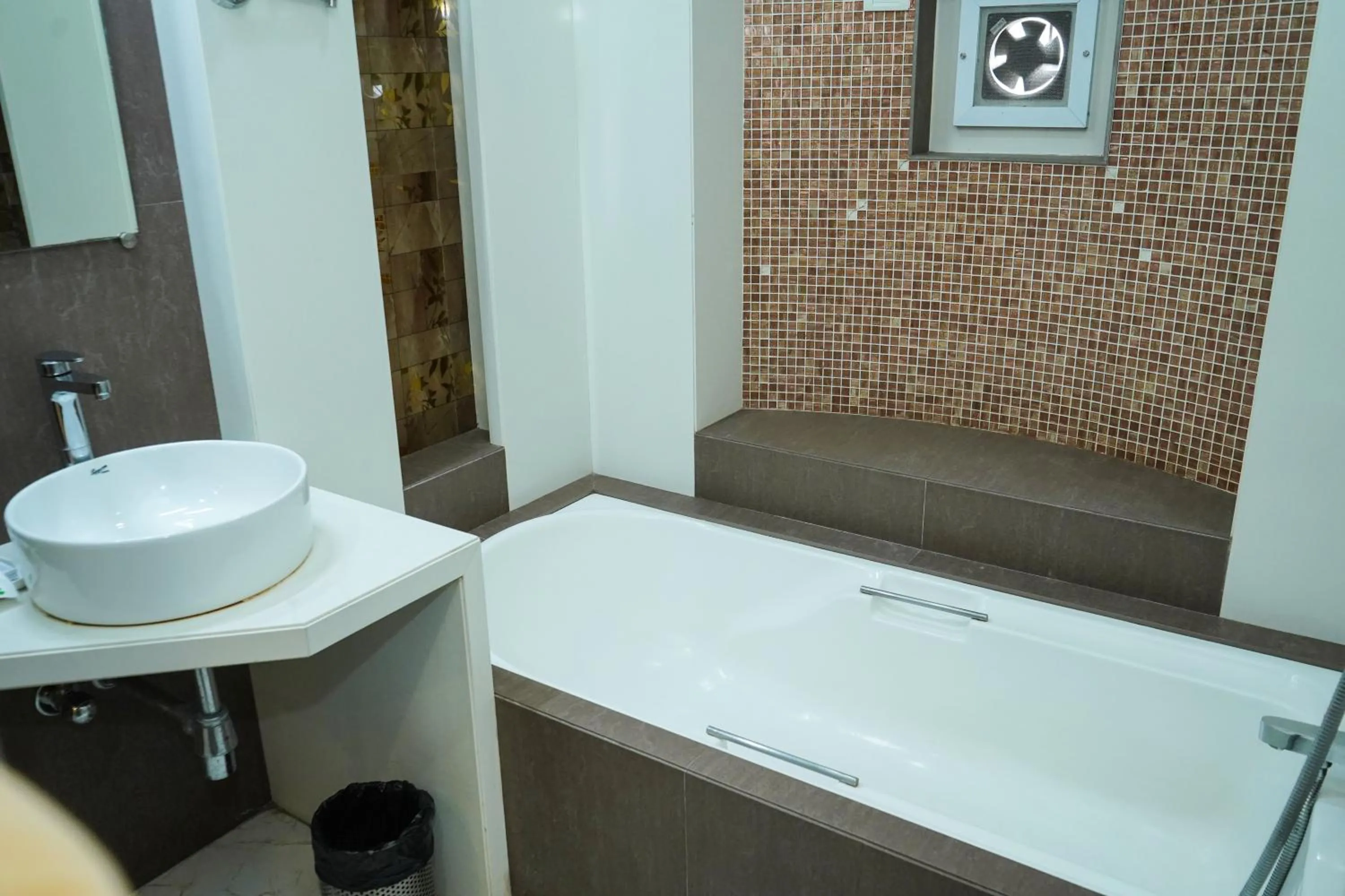 Bathroom in Hotel Spices Navi Mumbai
