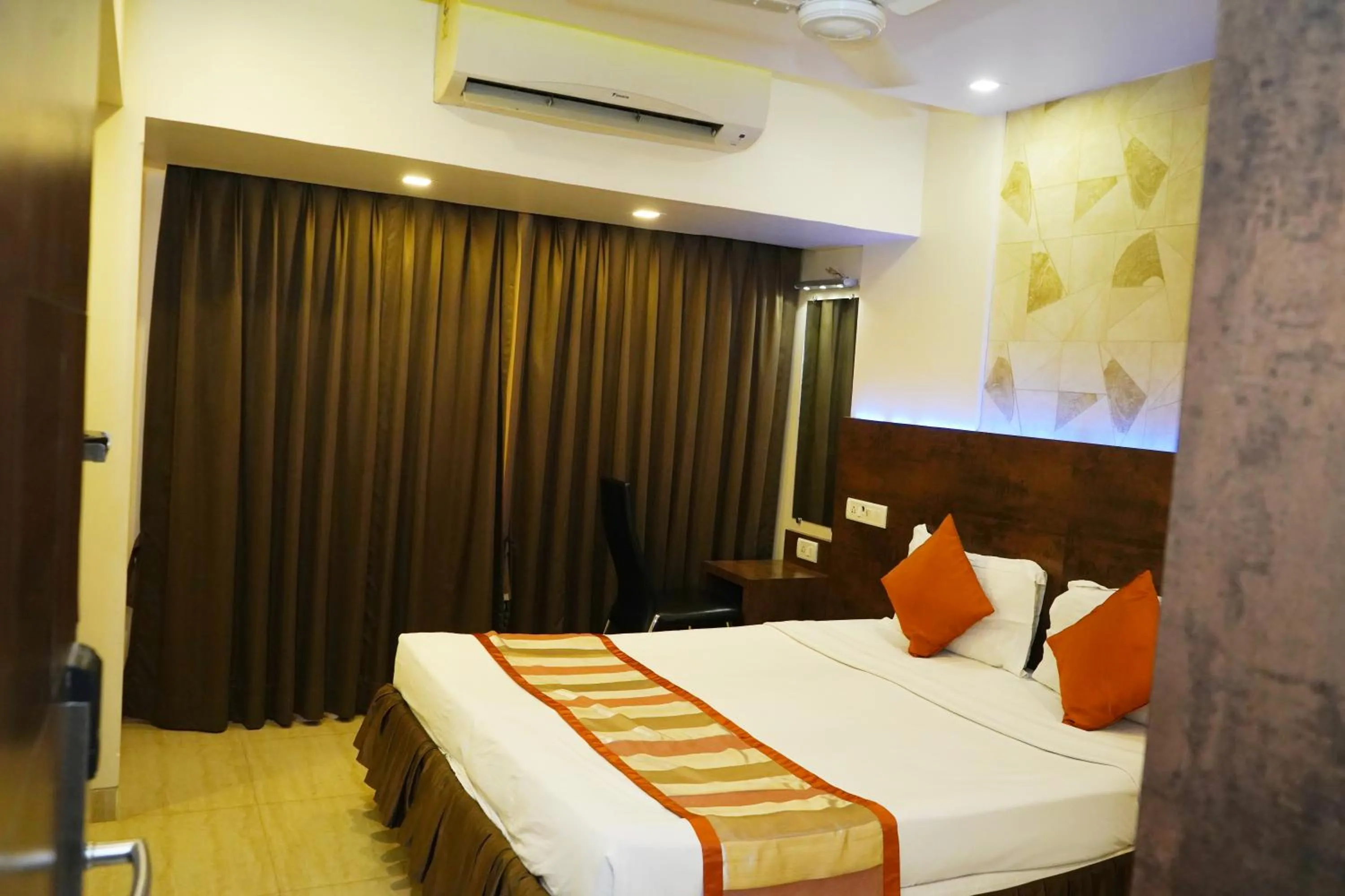 Bedroom, Bed in Hotel Spices Navi Mumbai