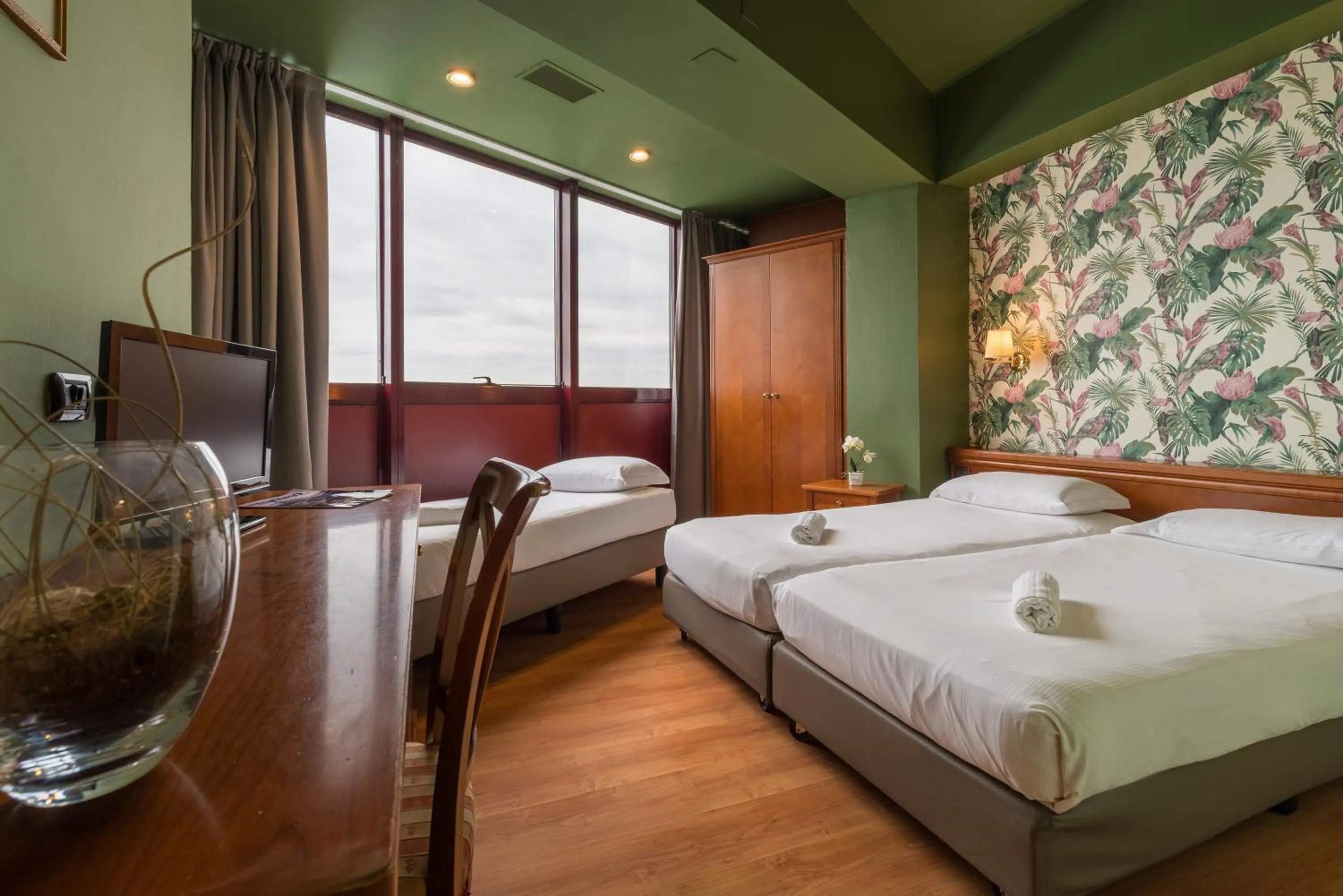 Bed in Hotel Antares Sport Beauty & Wellness