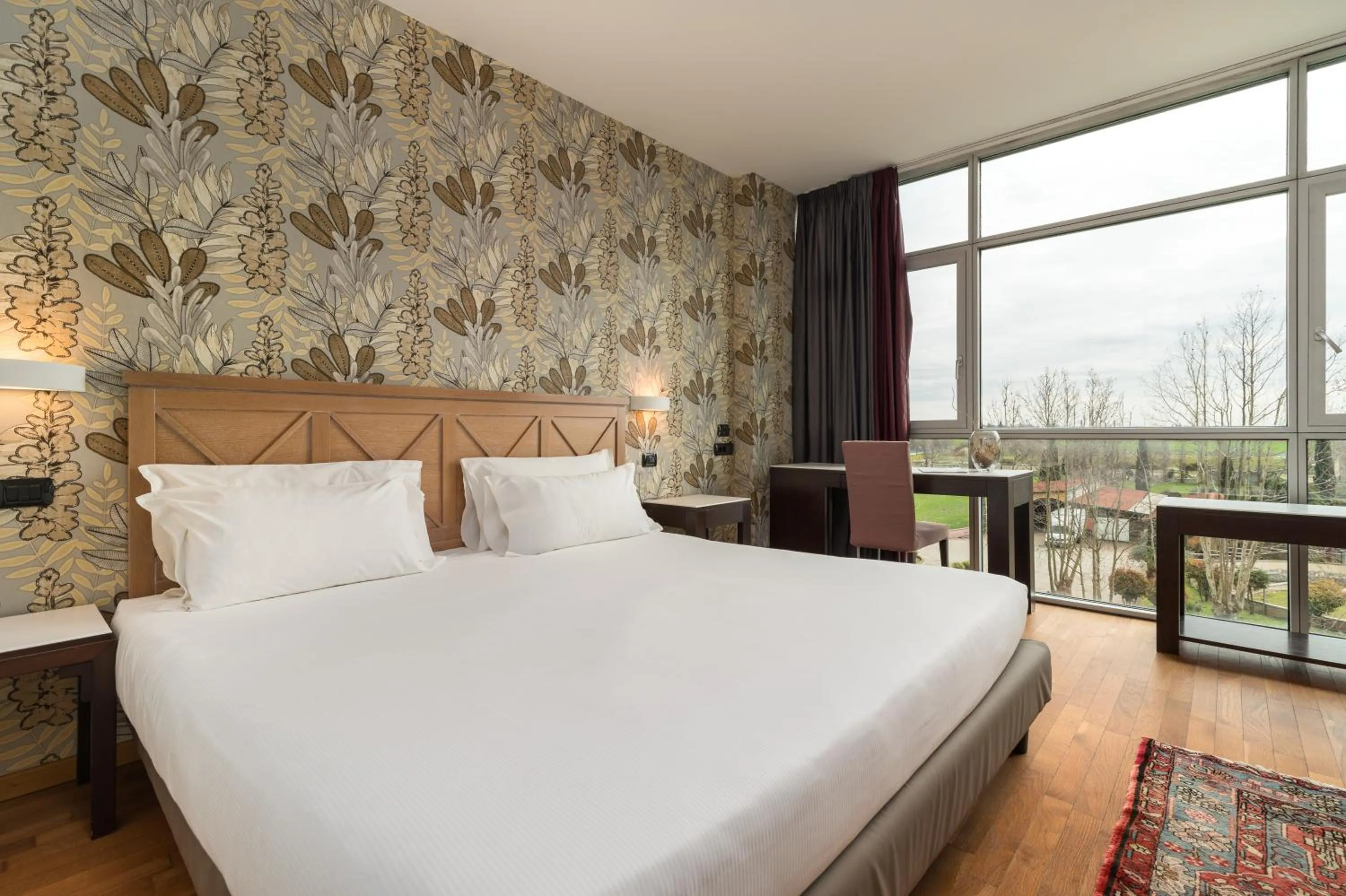 Bed in Hotel Antares Sport Beauty & Wellness