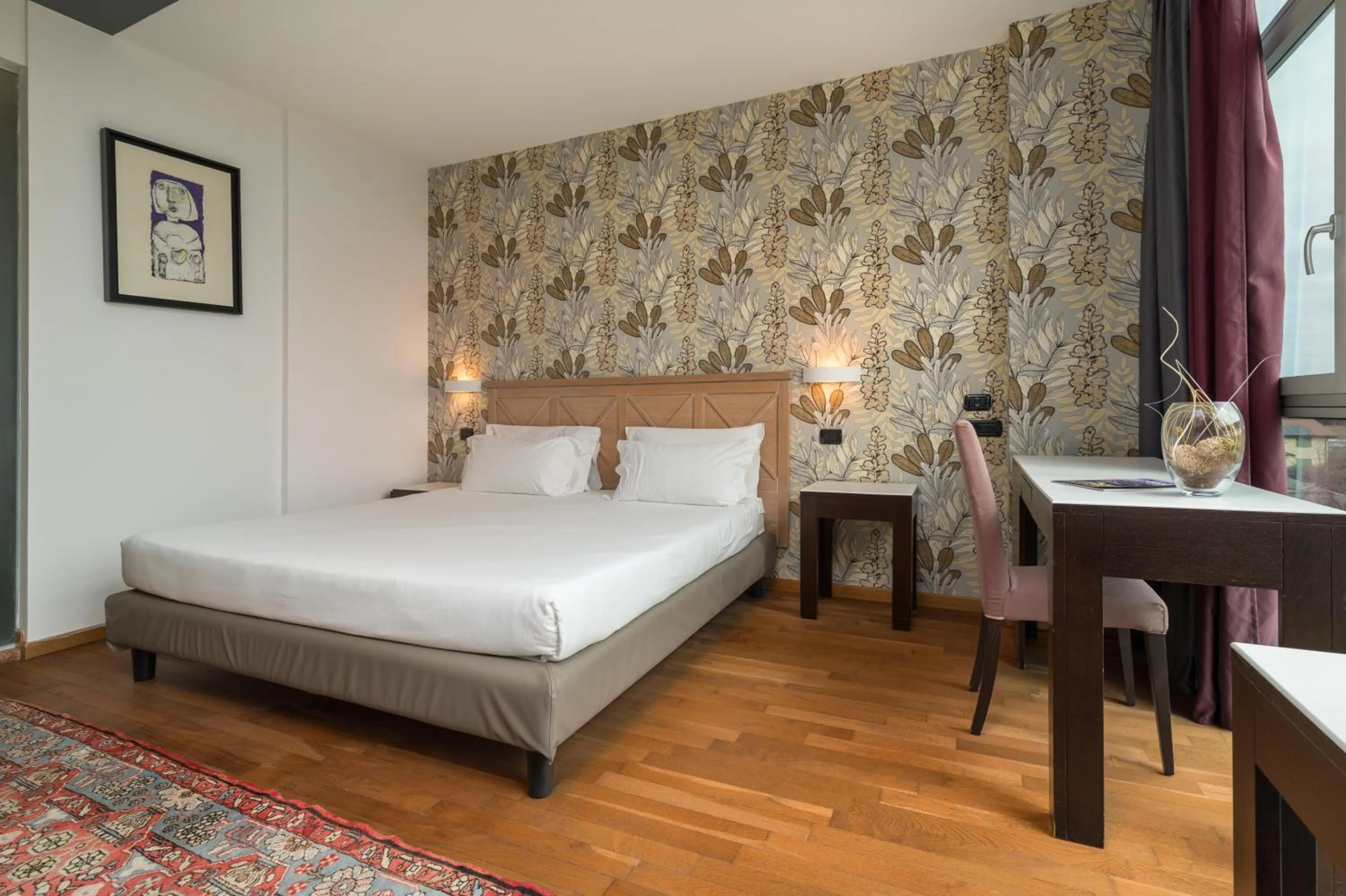 Bed in Hotel Antares Sport Beauty & Wellness