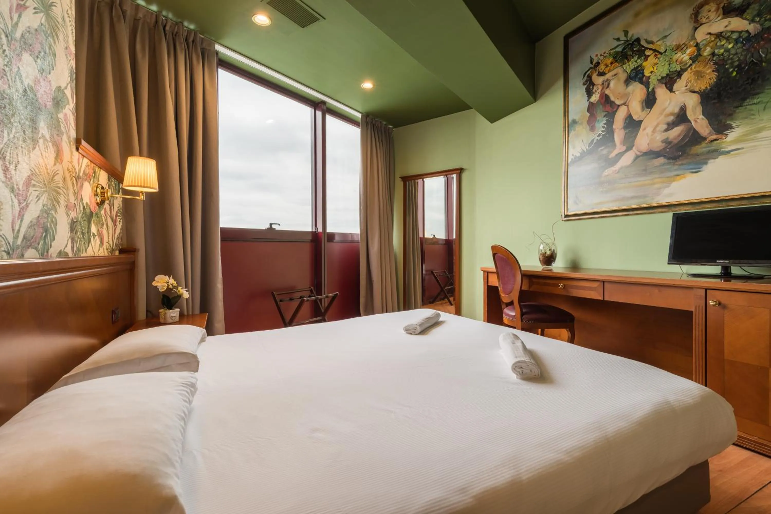 Bed in Hotel Antares Sport Beauty & Wellness