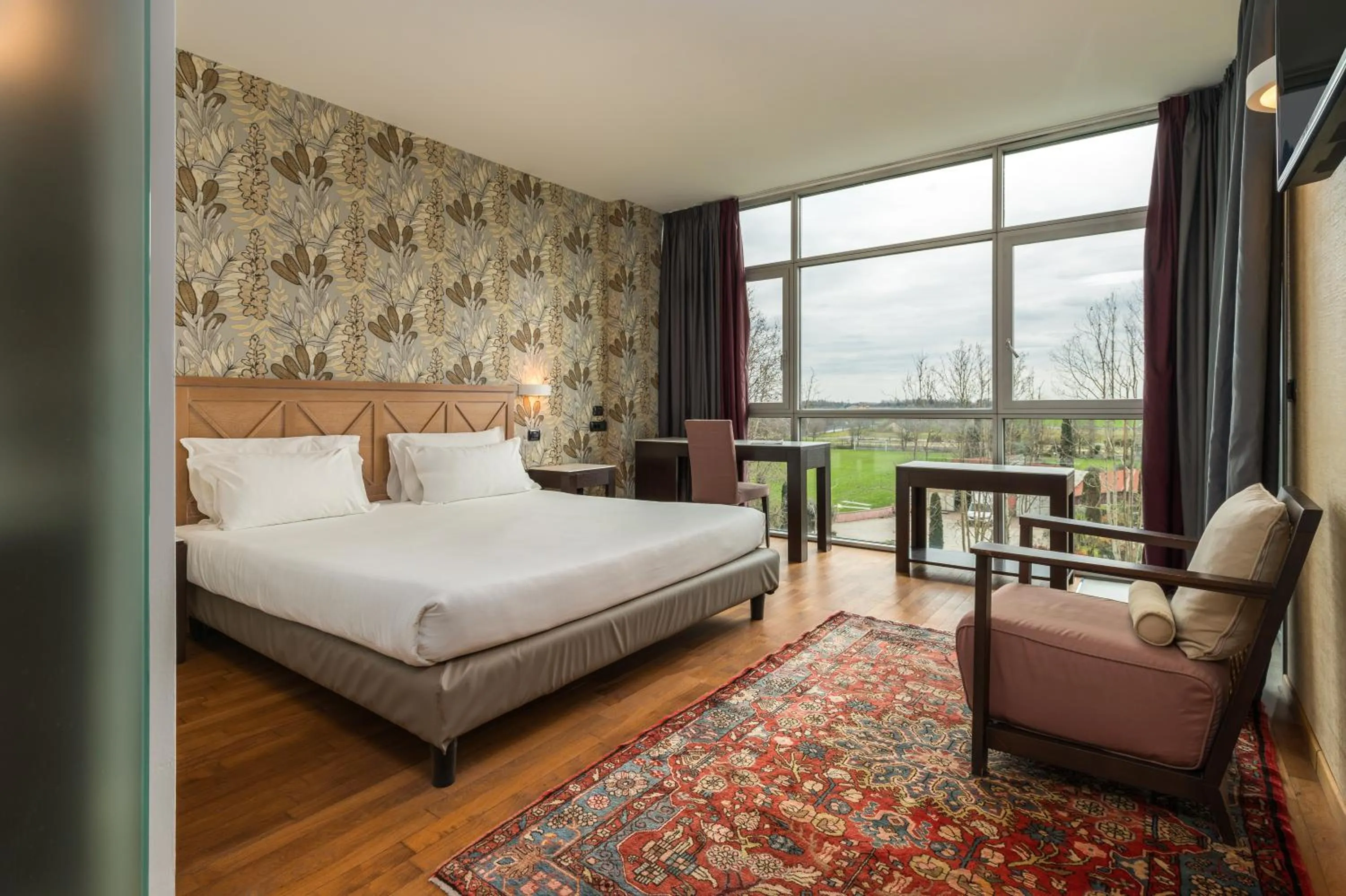 Bed in Hotel Antares Sport Beauty & Wellness