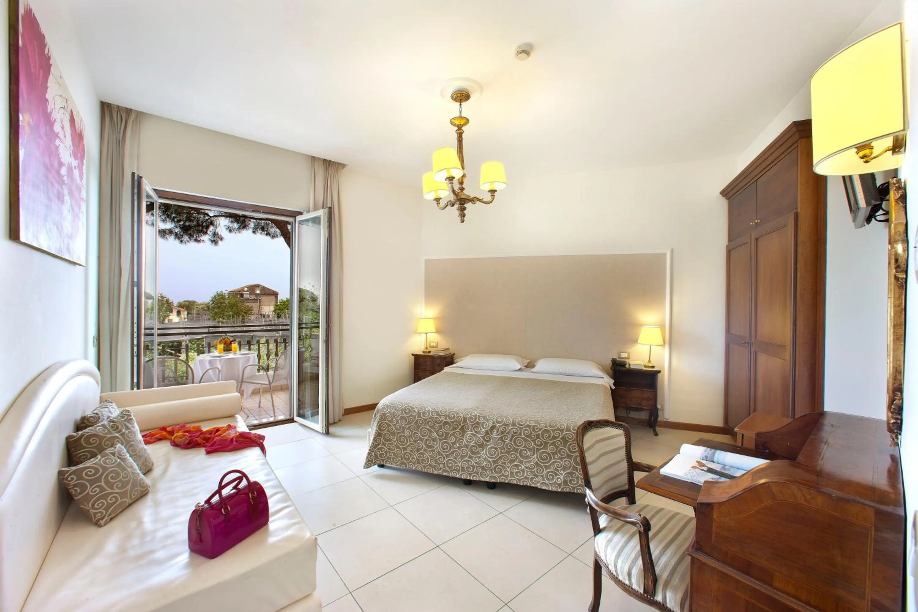 Balcony/Terrace, Bed in Hotel Alpha