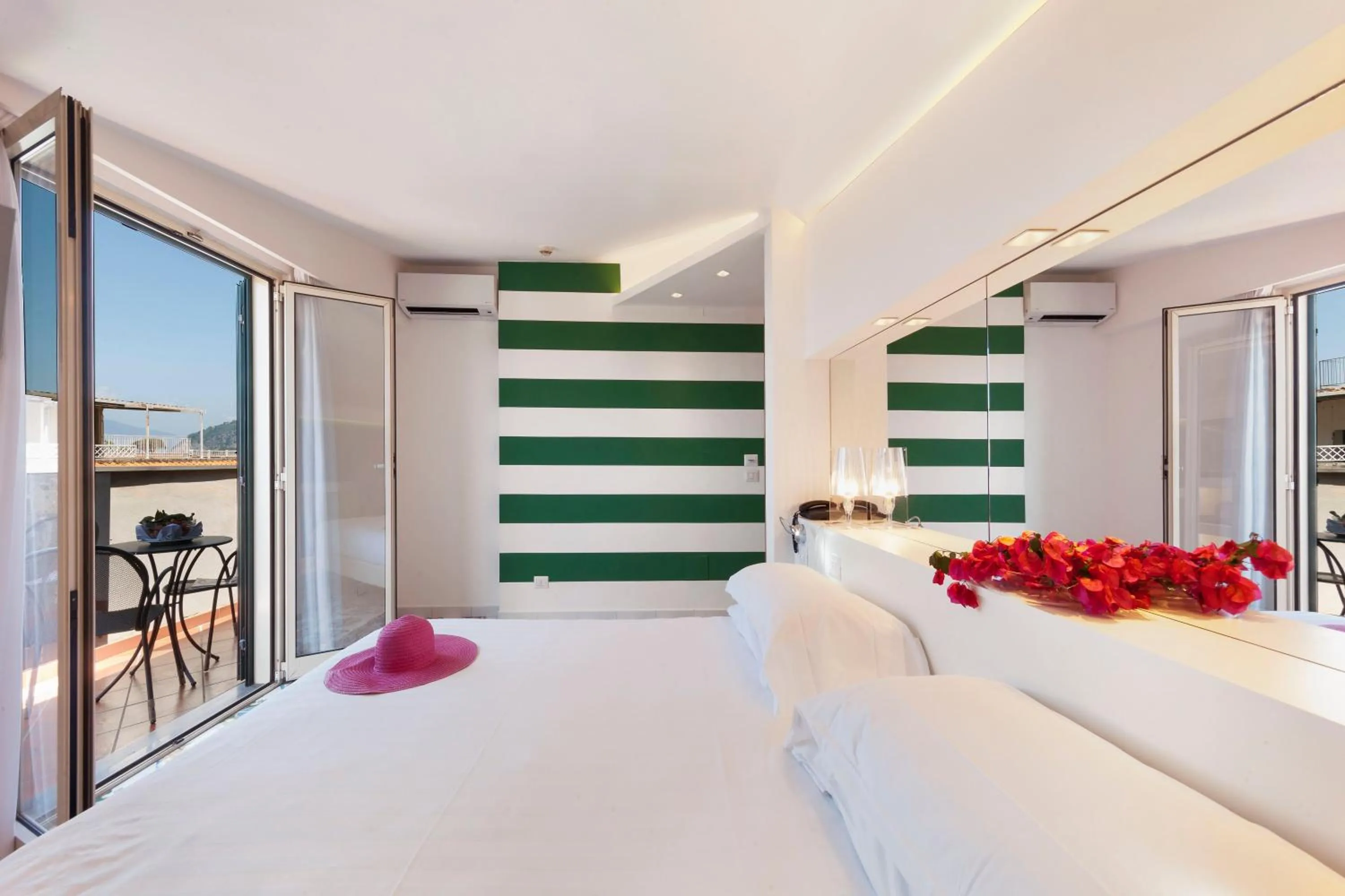 Balcony/Terrace, Bed in Hotel Alpha