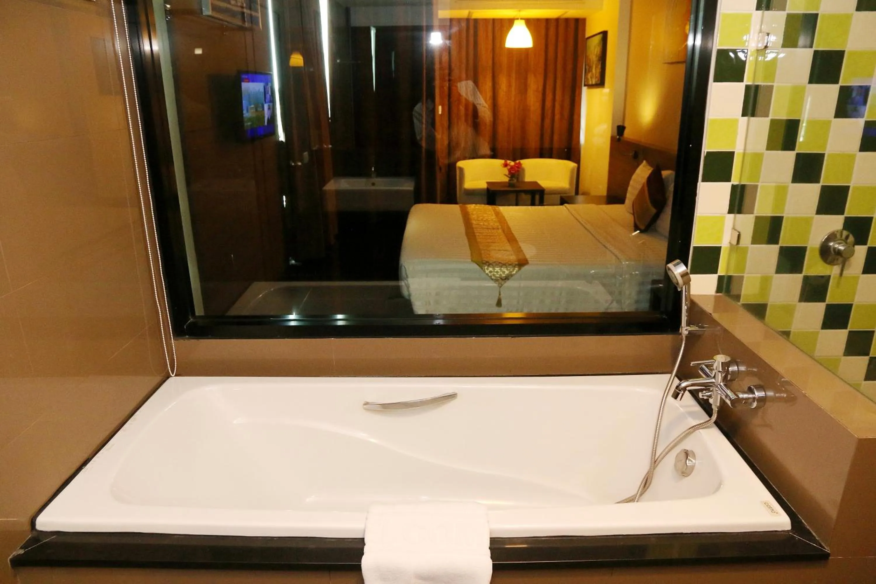 Bed in Arthitaya Green Nature Hotel & Lakkhana Poolside Resort