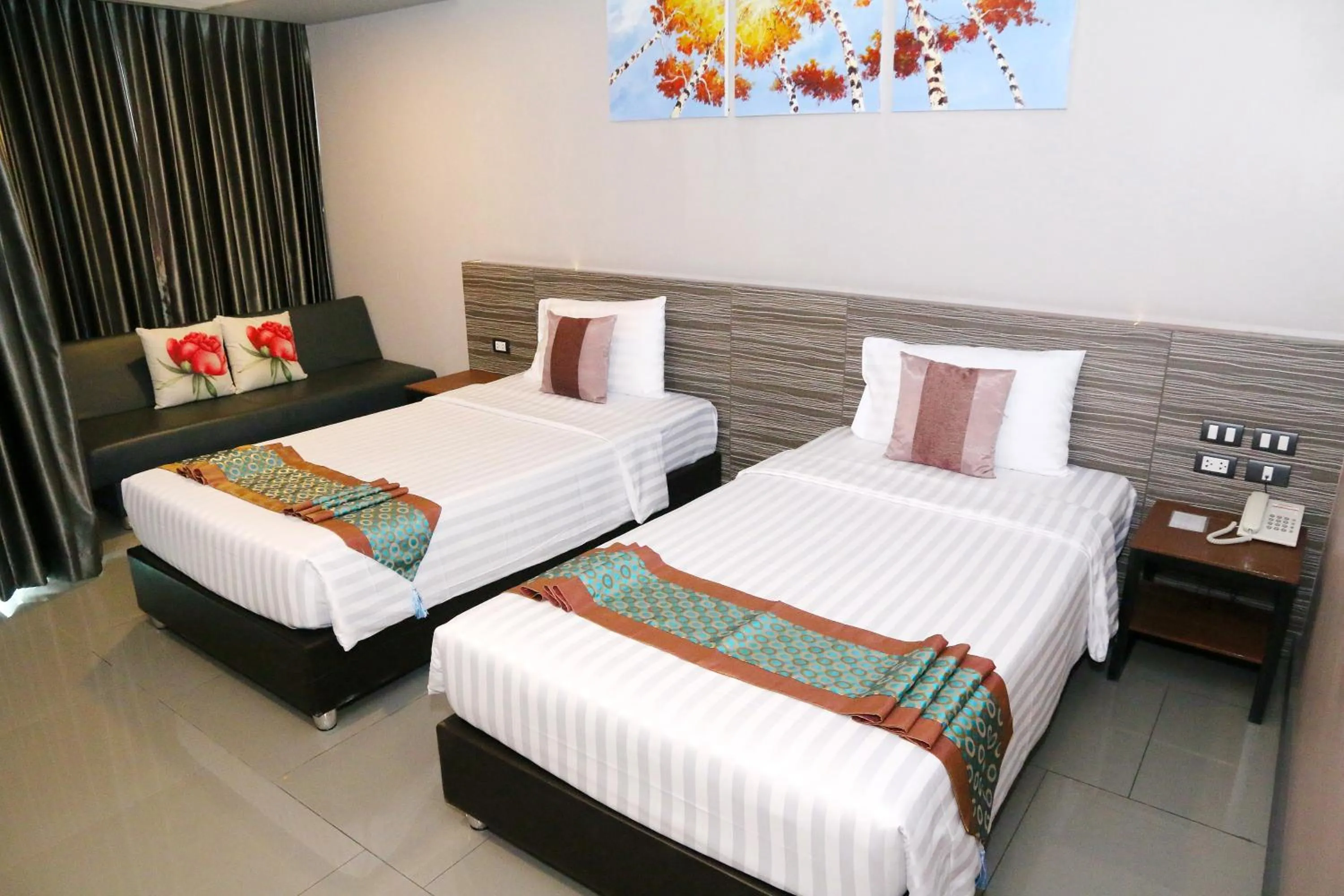 Bed in Arthitaya Green Nature Hotel & Lakkhana Poolside Resort