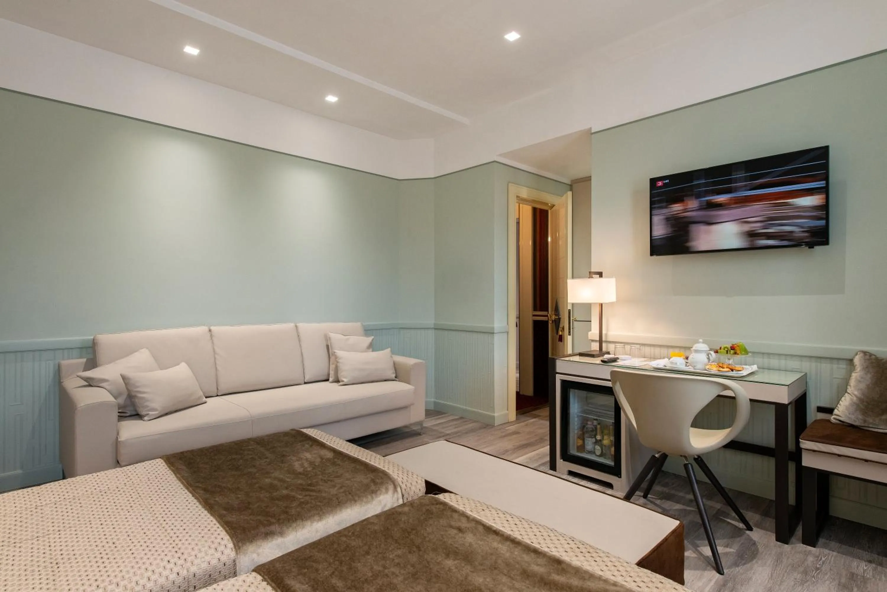 Bed in Atlante Star Hotel