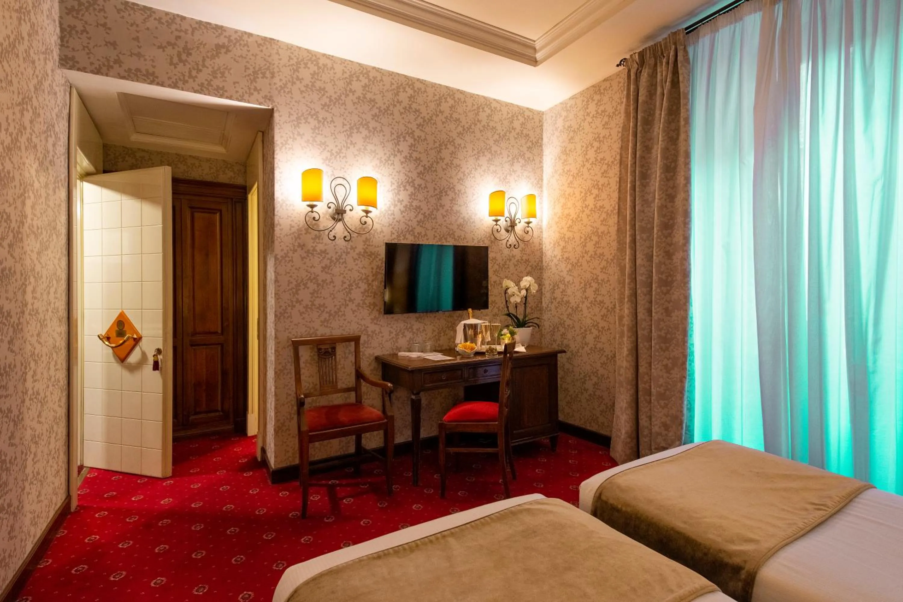 Bed in Atlante Star Hotel