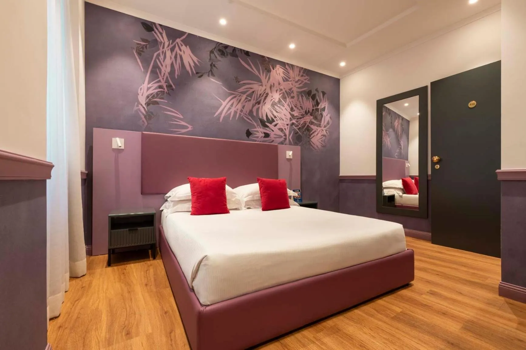 Bed in Atlante Star Hotel