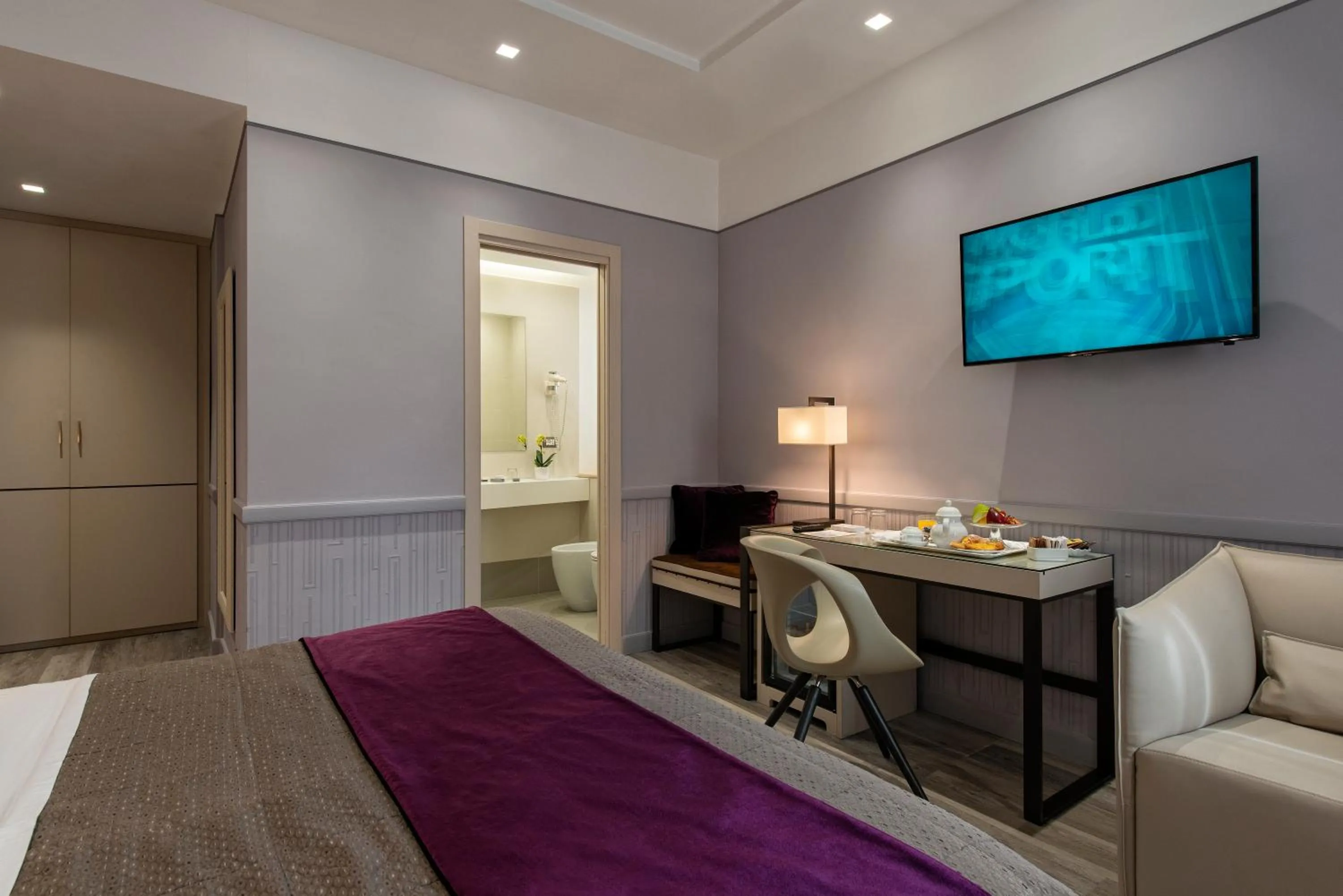 Bed in Atlante Star Hotel