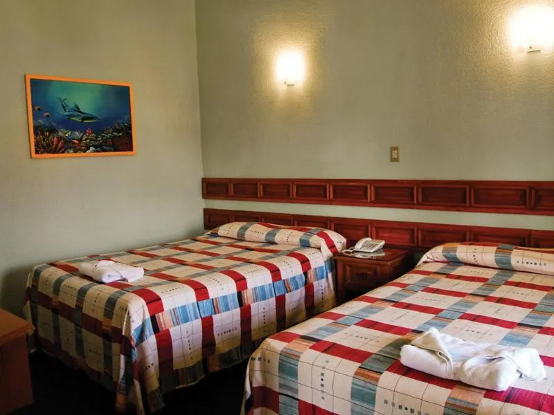 Bed in Hotel Arrecife de Coral