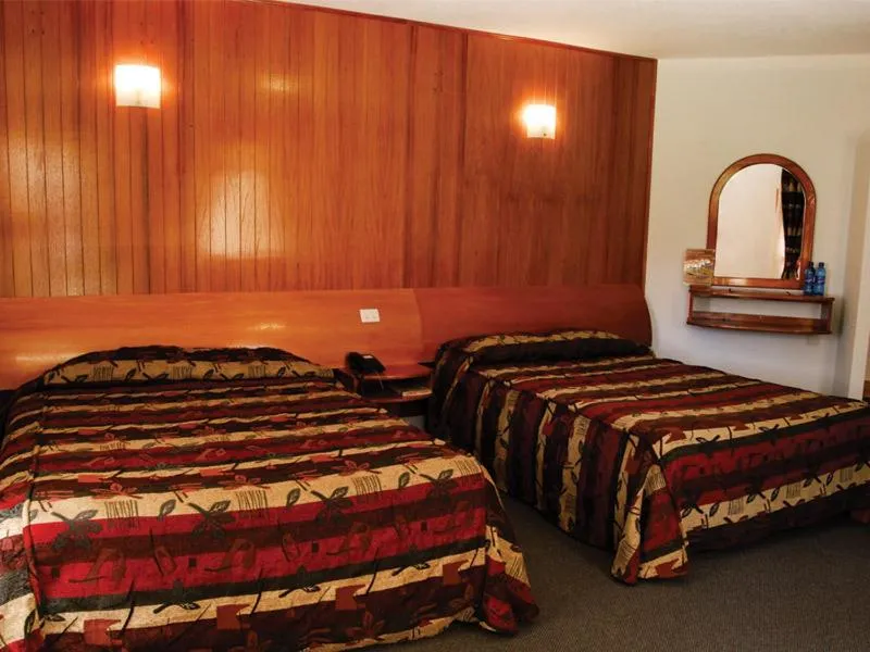 Bed in Hotel Arrecife de Coral