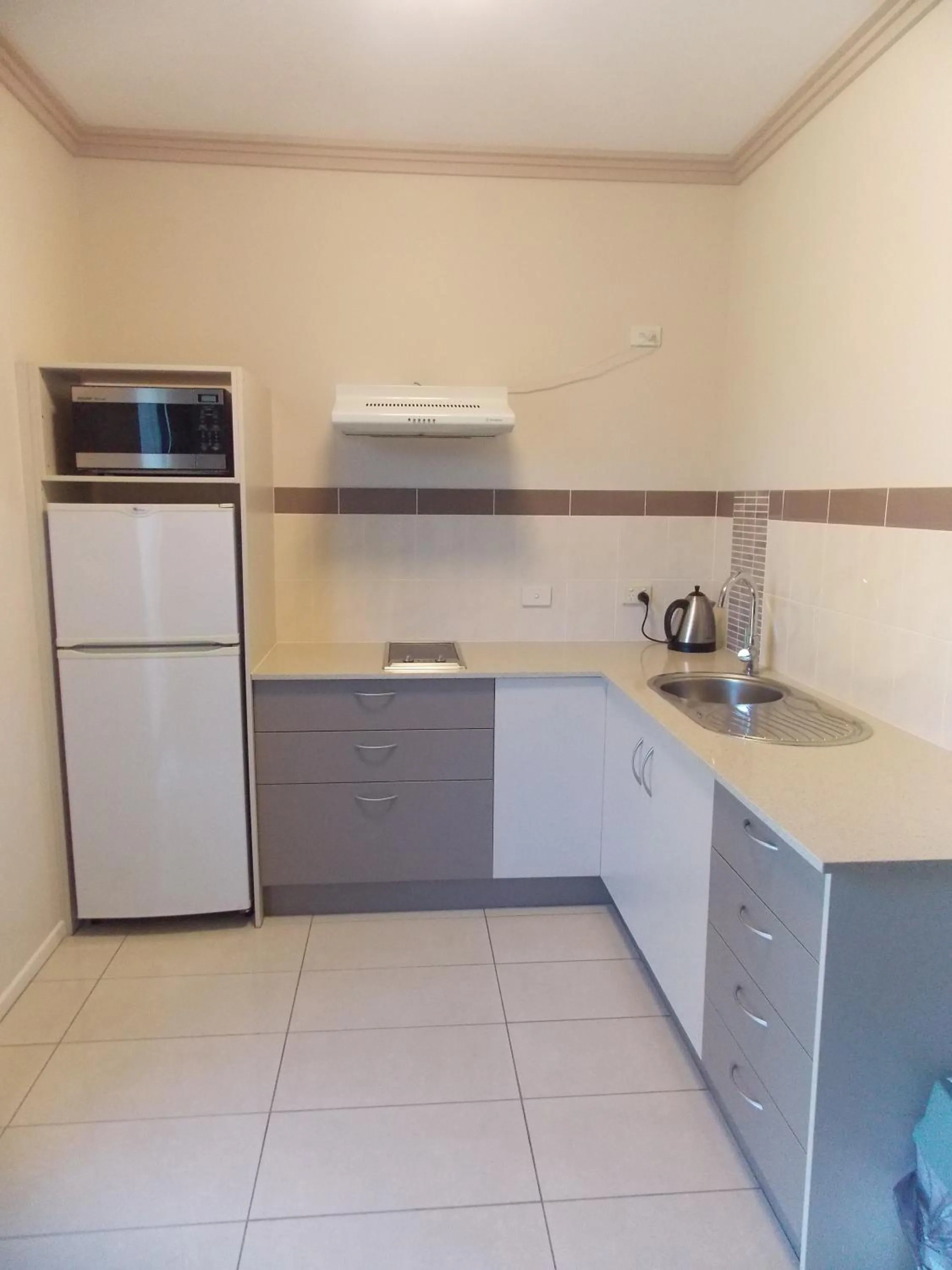 Kitchen or kitchenette in Emerald Executive Apartments