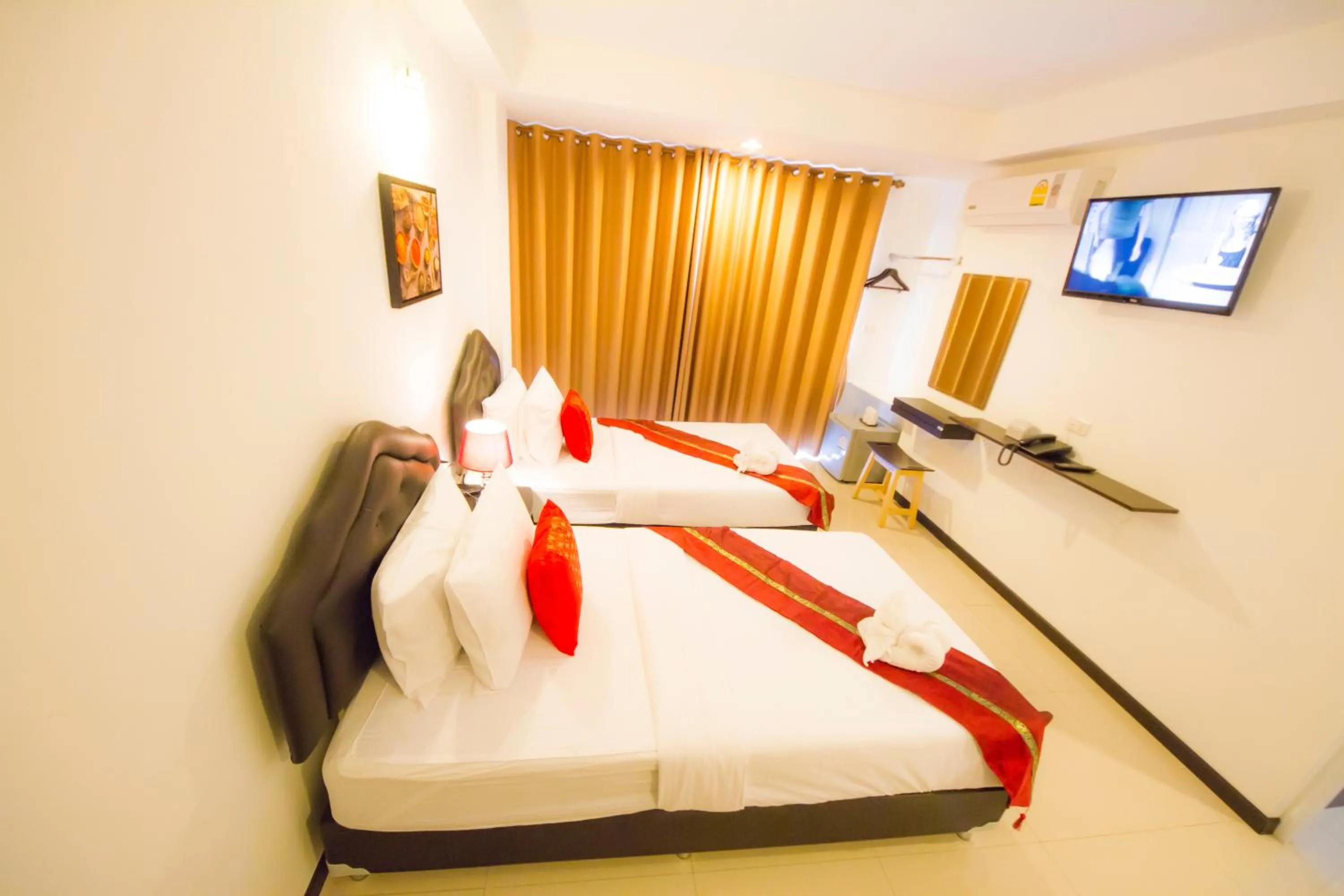 Photo of the whole room, Bed in TH beach hotel