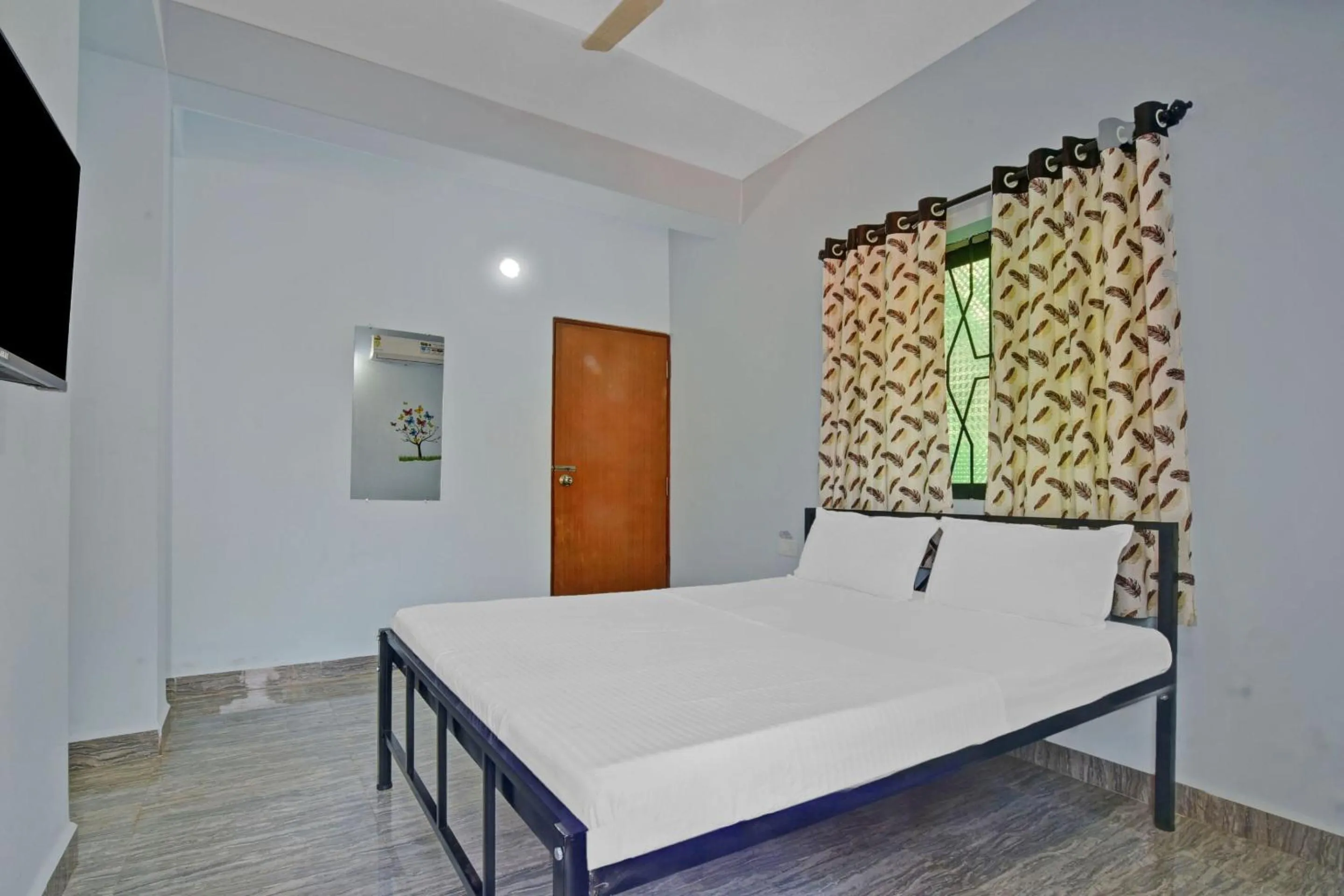 Bedroom in Hotel O by OYO Sai Leela