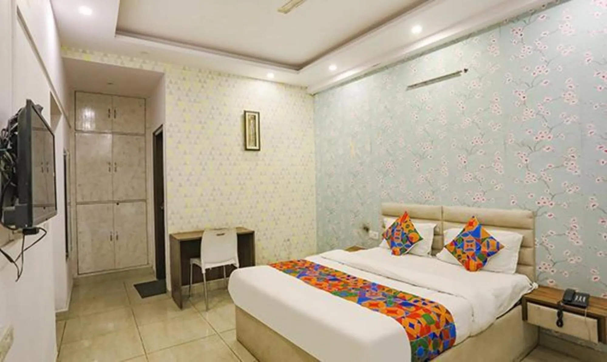 Bed in FabHotel Comfirt Inn