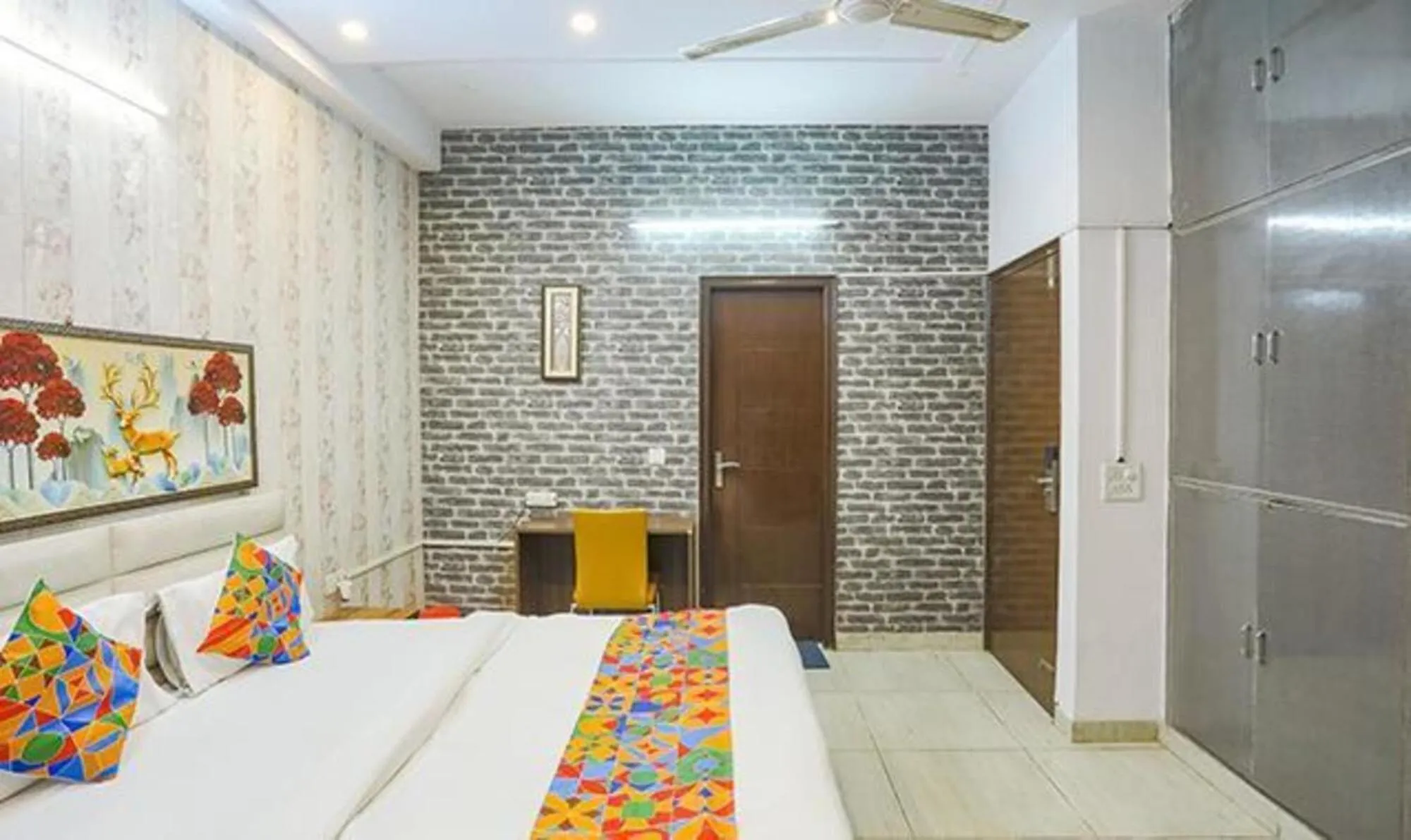 Bed in FabHotel Comfirt Inn