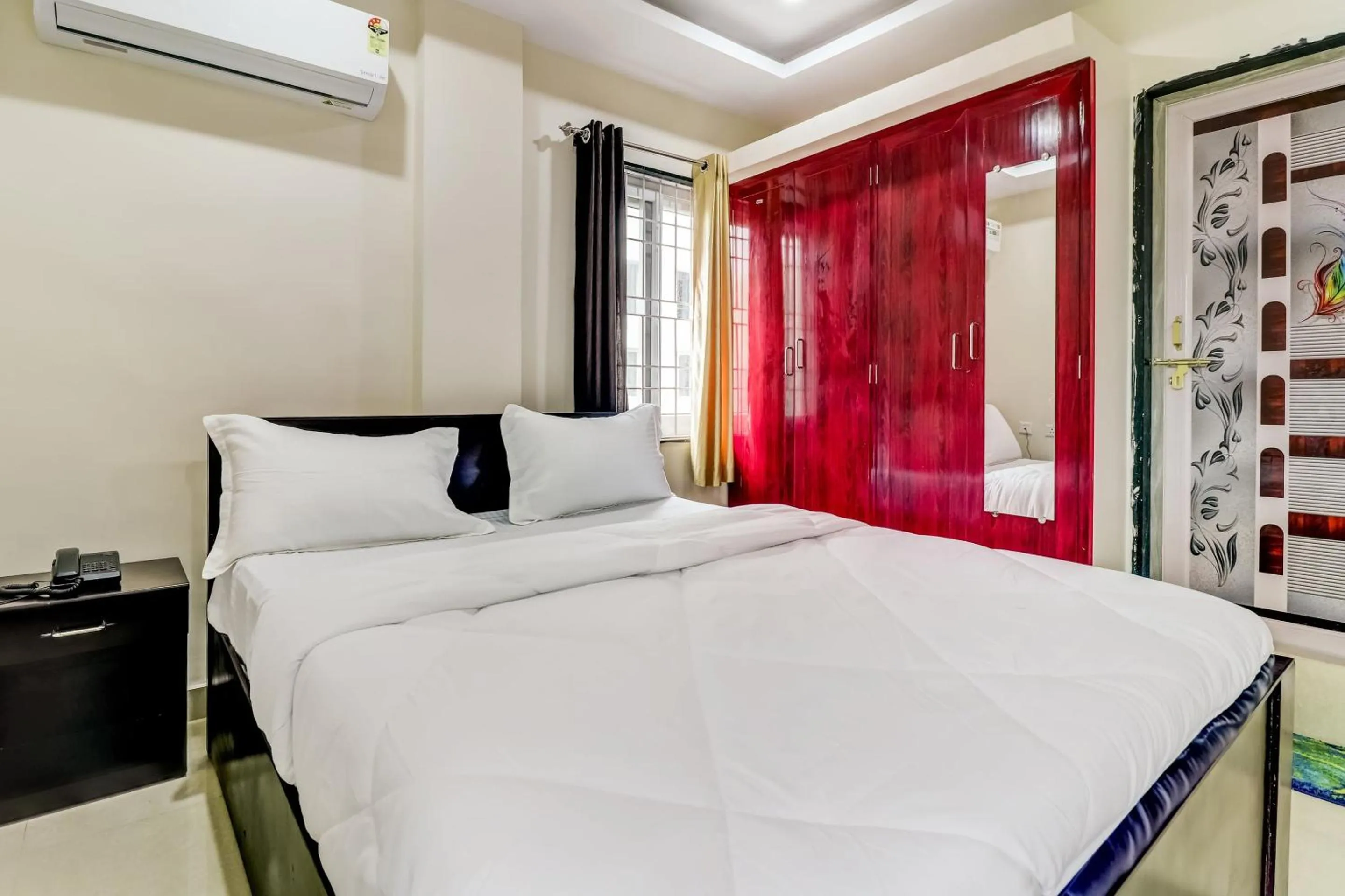 Bedroom in Hotel O Sri Singampalli Residency