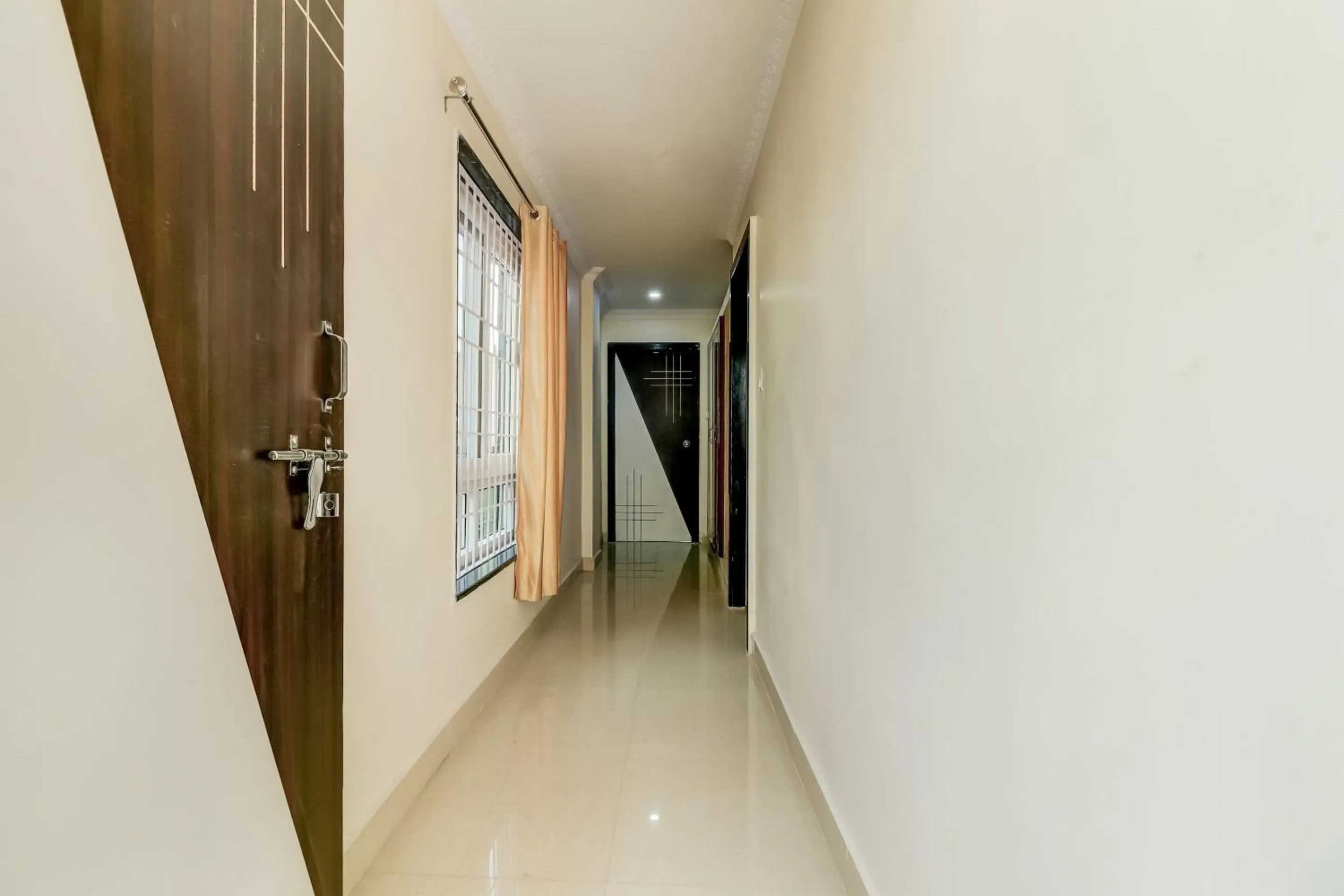 Bedroom in Hotel O Sri Singampalli Residency