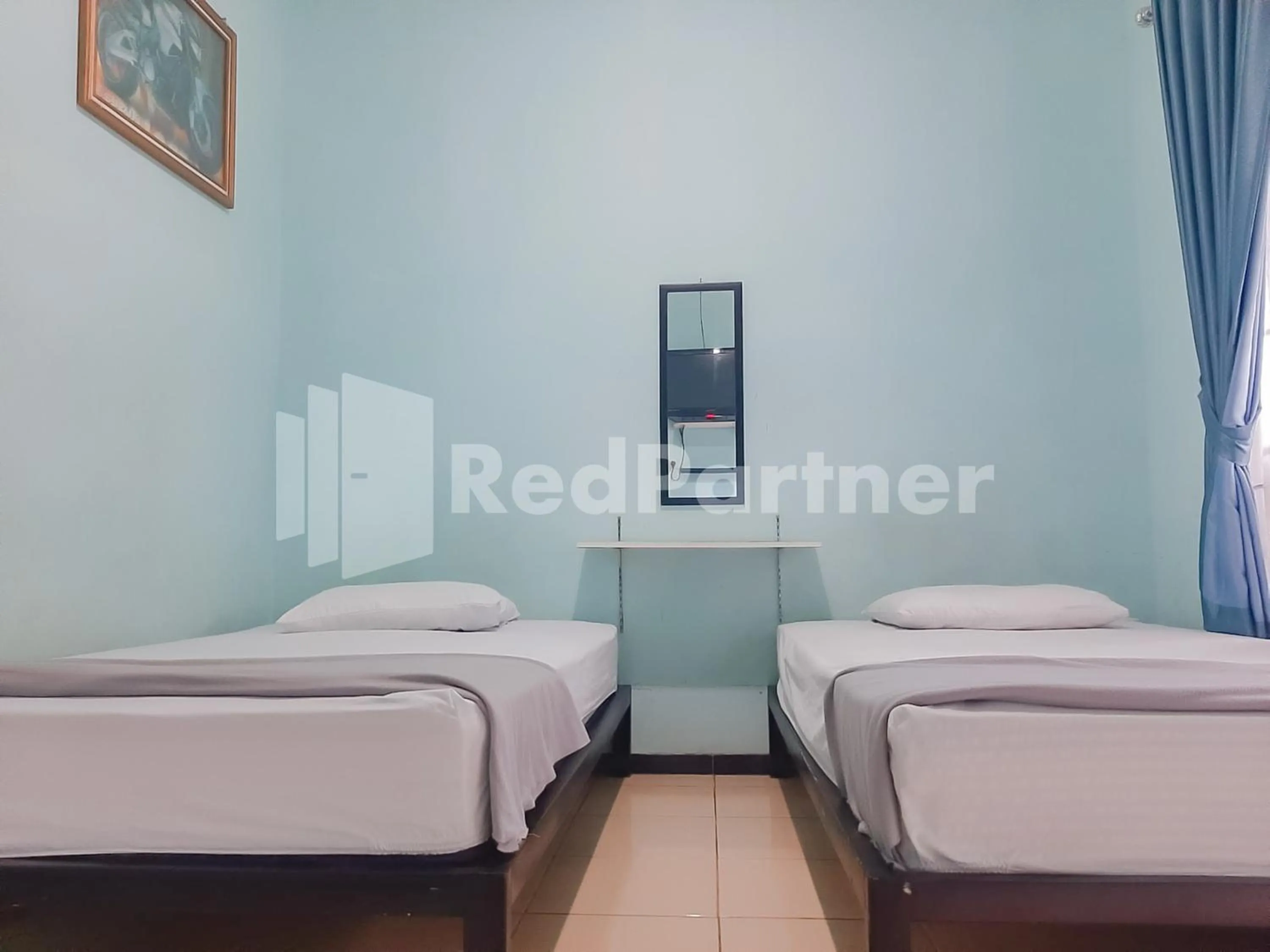 Bed in Syariah Safar Guest House Mitra RedDoorz