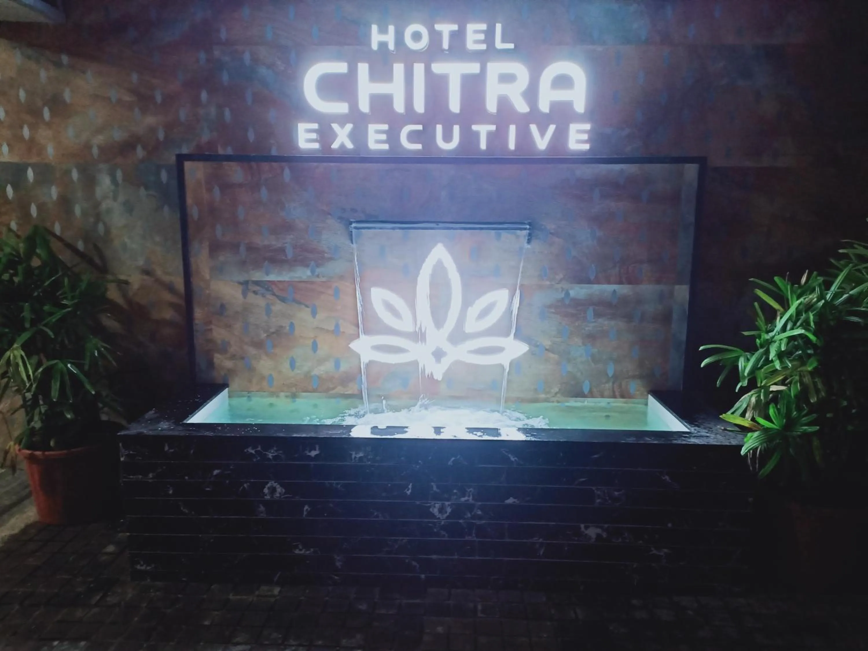 Property logo or sign in Hotel Chitra Executive
