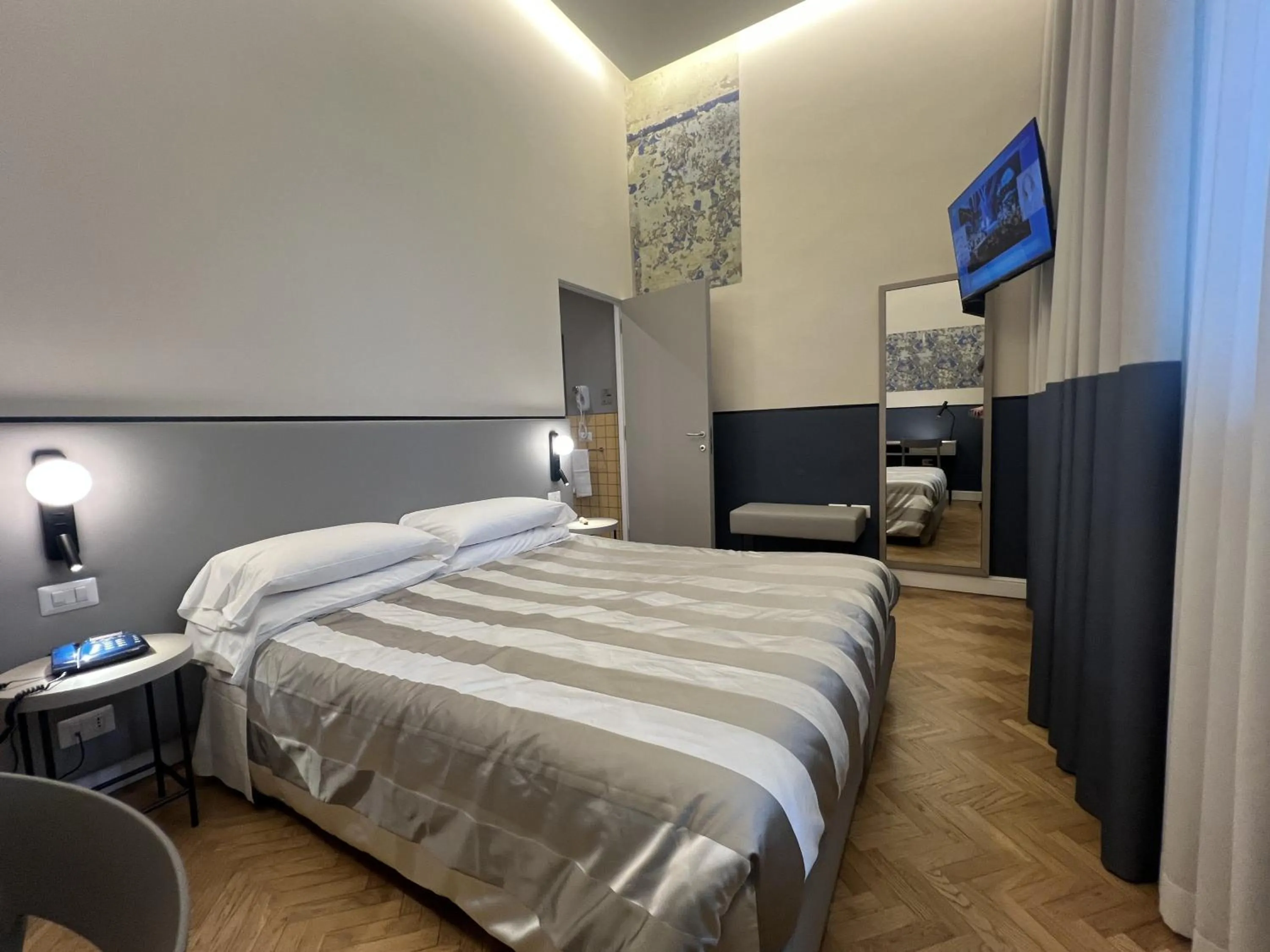 TV and multimedia, Bed in Hotel Il Sole