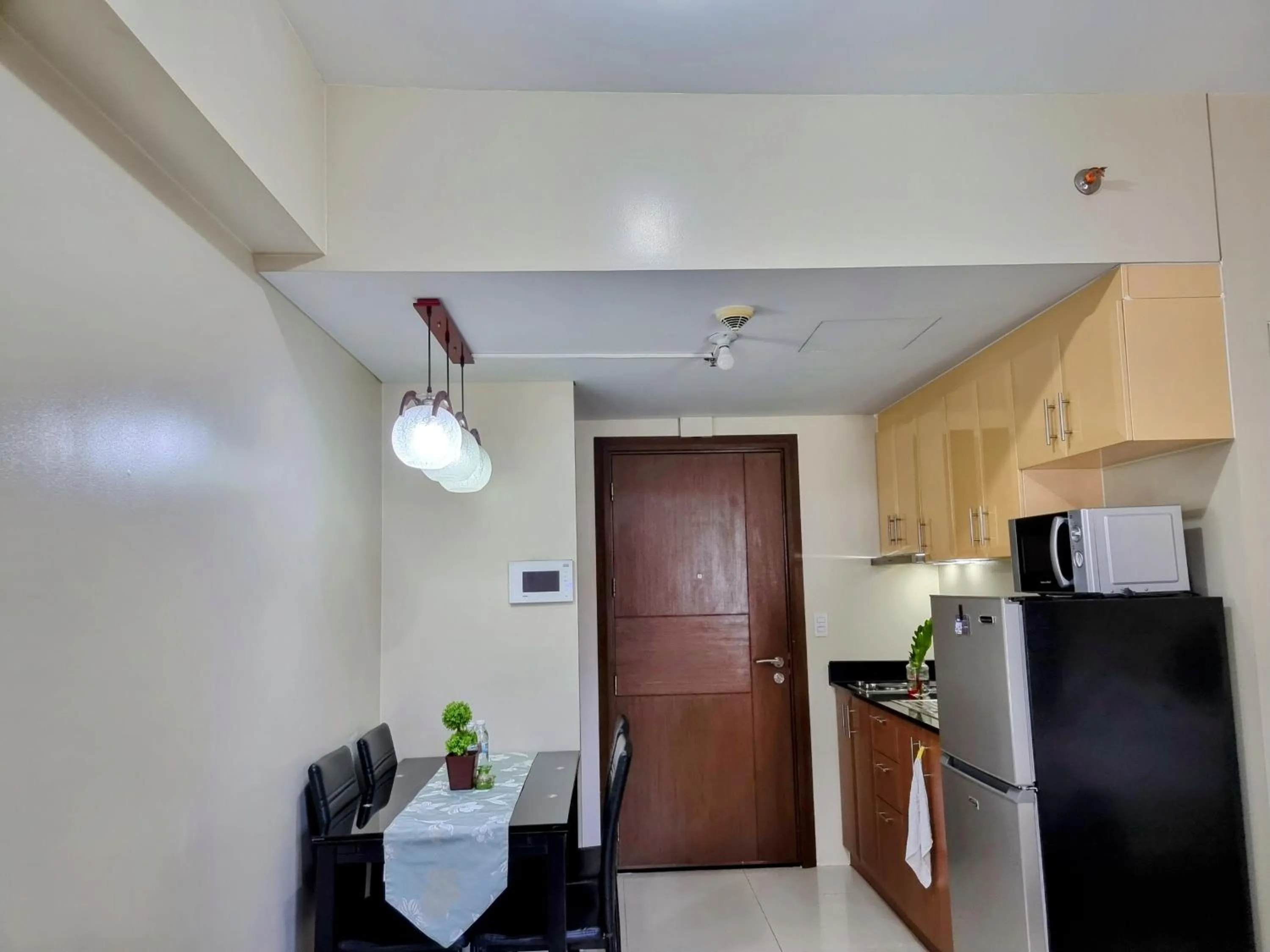Kitchen or kitchenette in One Palm Tree Villas Condo Across NAIA Terminal 3