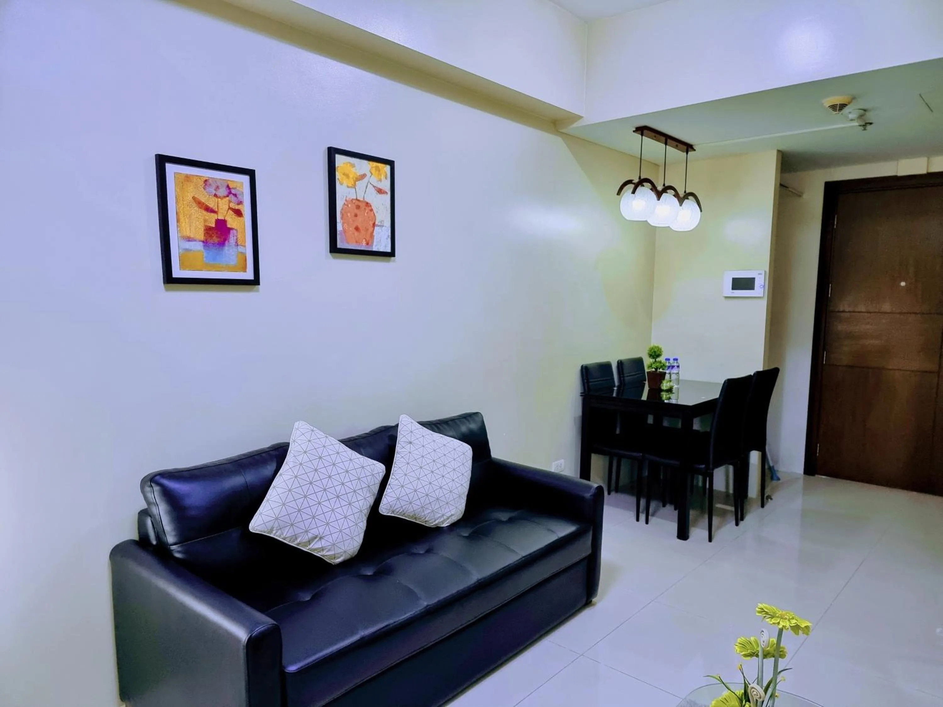 Living room in One Palm Tree Villas Condo Across NAIA Terminal 3