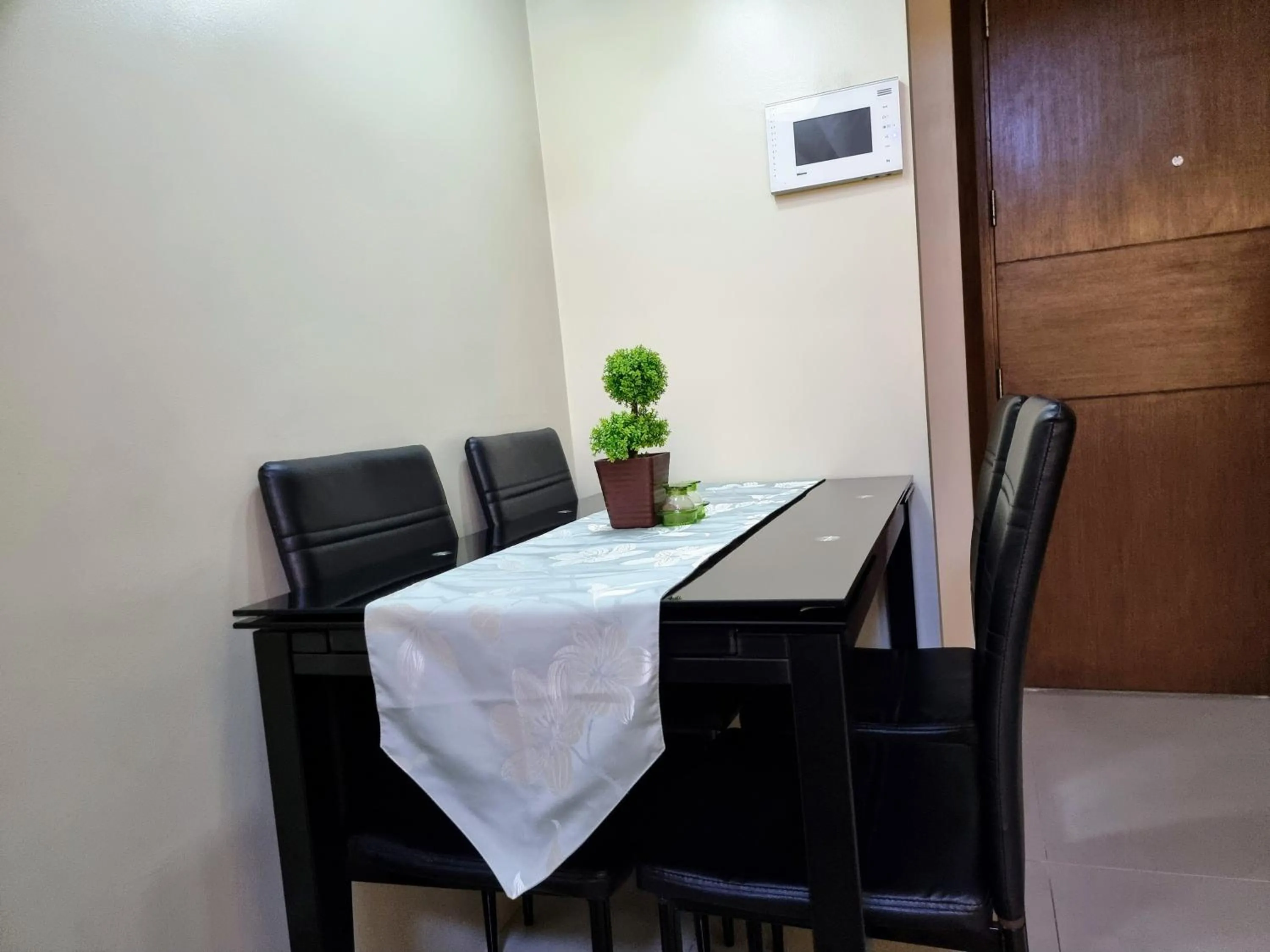 Dining area in One Palm Tree Villas Condo Across NAIA Terminal 3