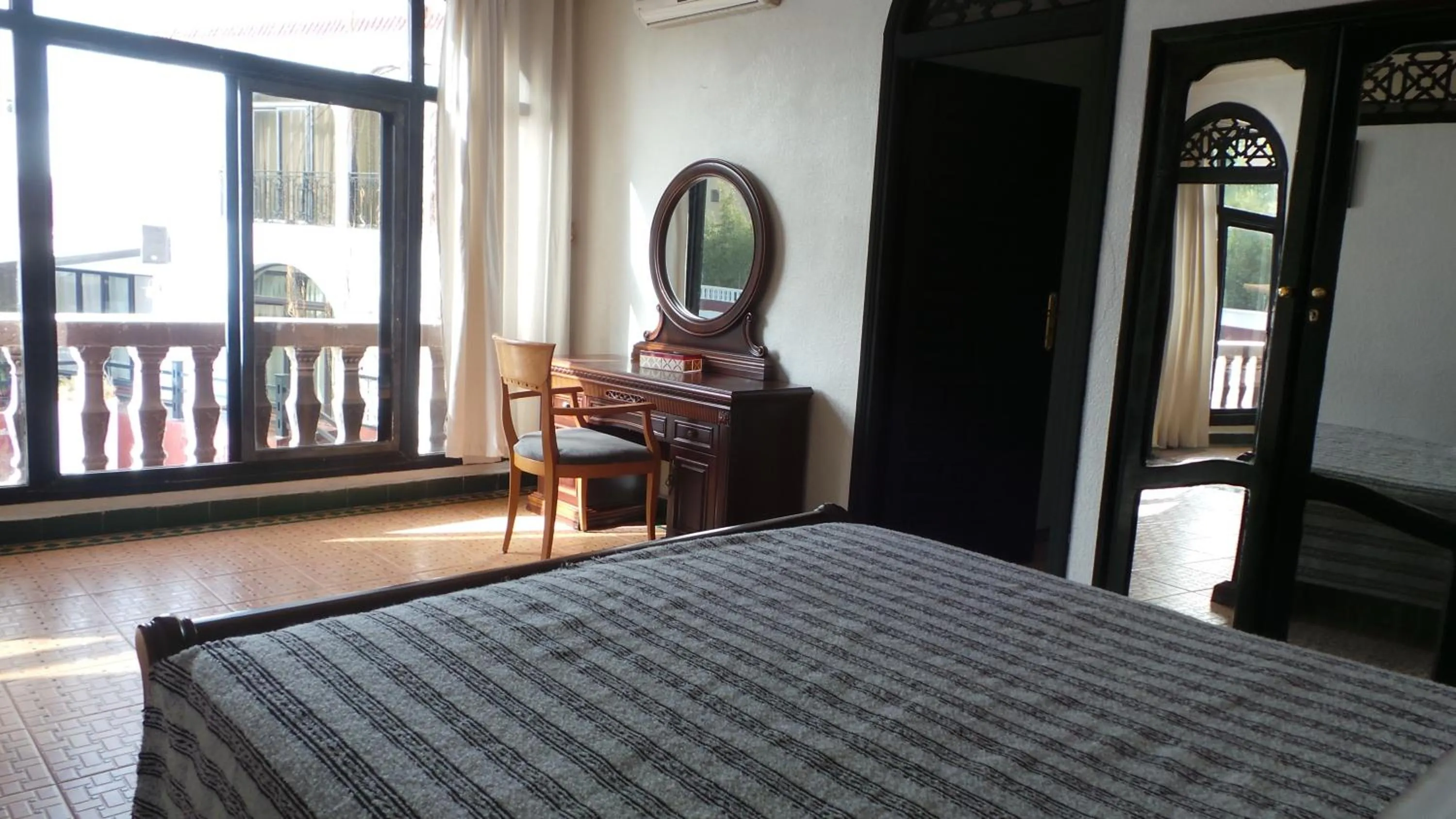 Photo of the whole room, Bed in Targafit Hotel & Hammam