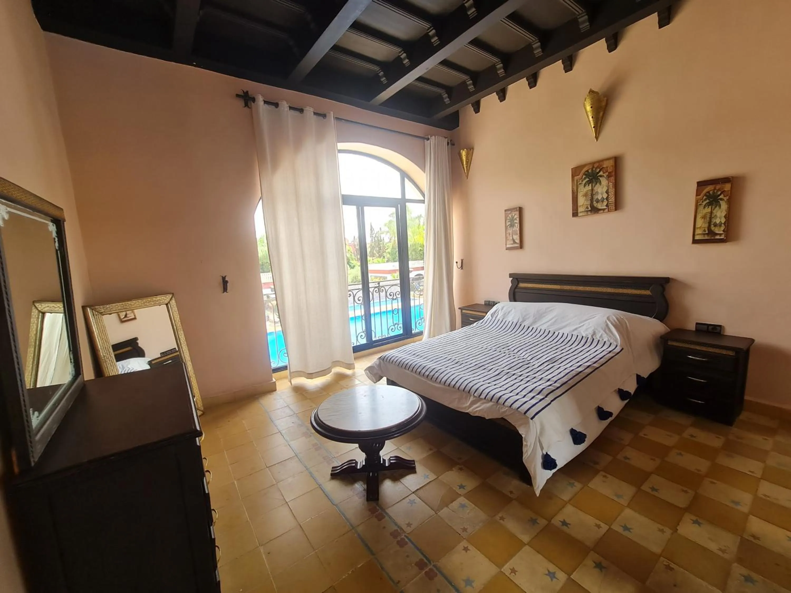 Photo of the whole room, Bed in Targafit Hotel & Hammam