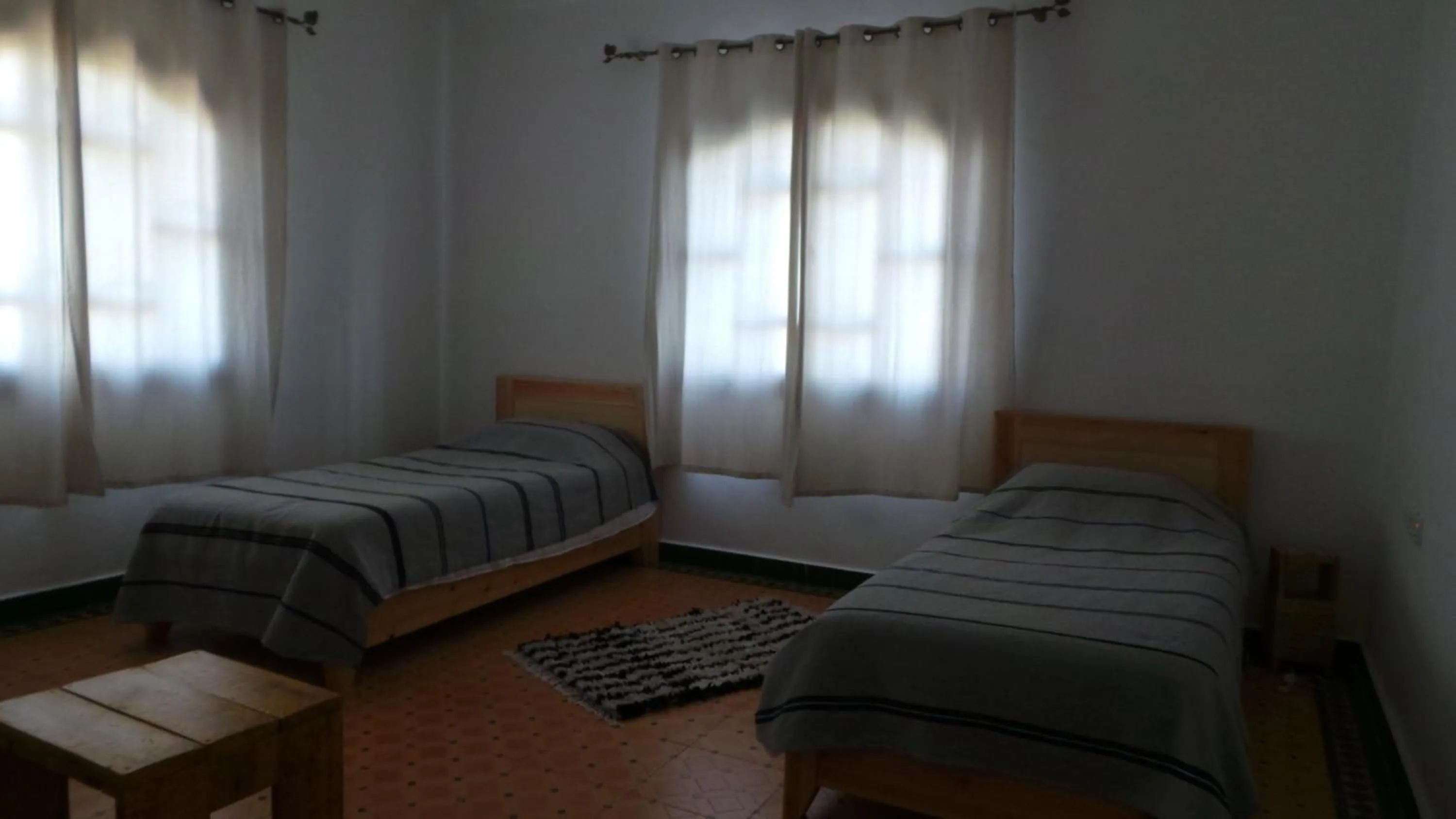 Photo of the whole room, Bed in Targafit Hotel & Hammam