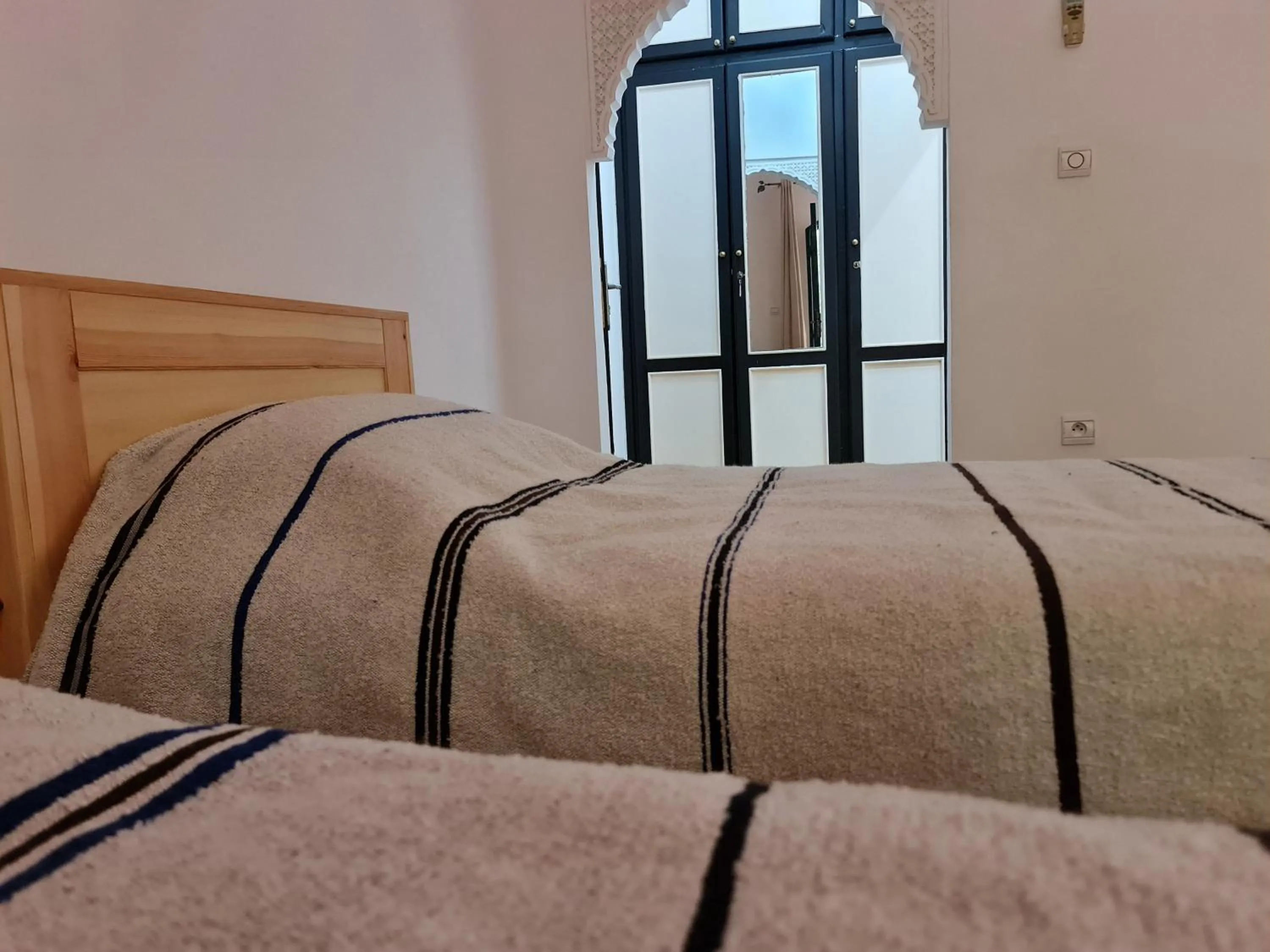 Bed in Targafit Hotel & Hammam