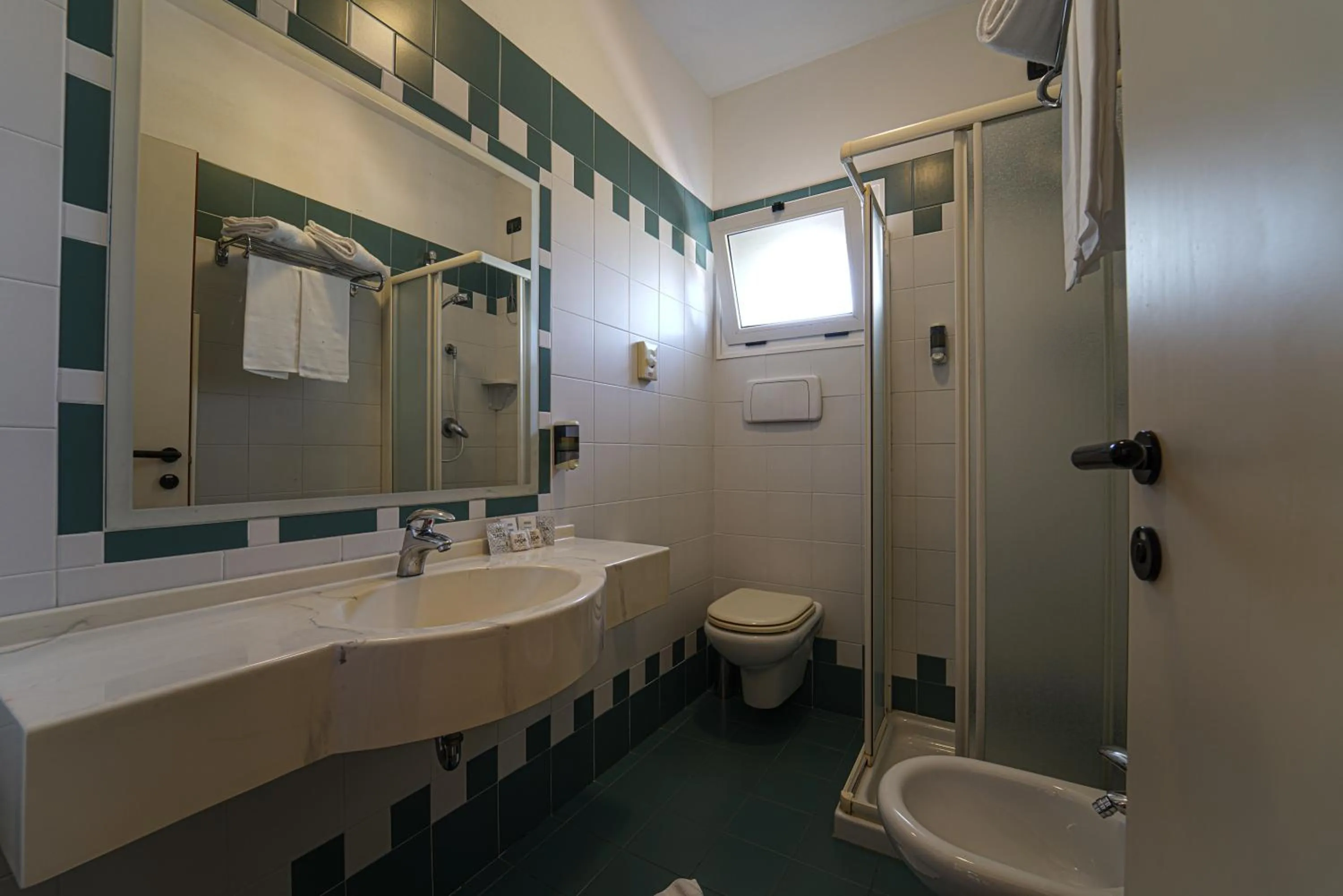 Bathroom in Dasamo Hotel - Dada Hotels