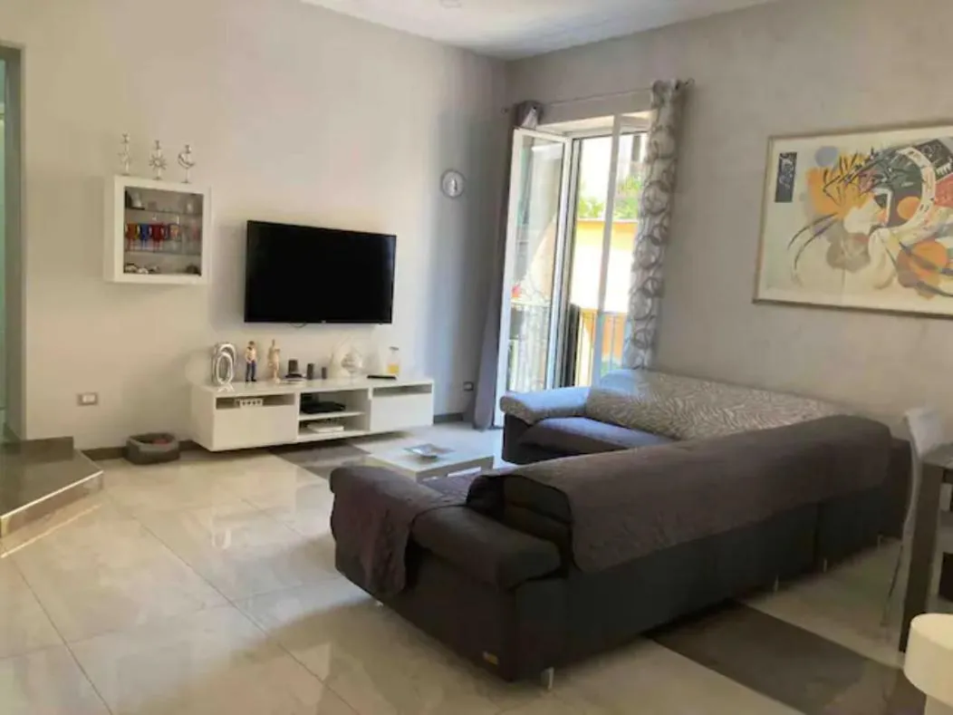 Communal lounge/ TV room in B&B Michela