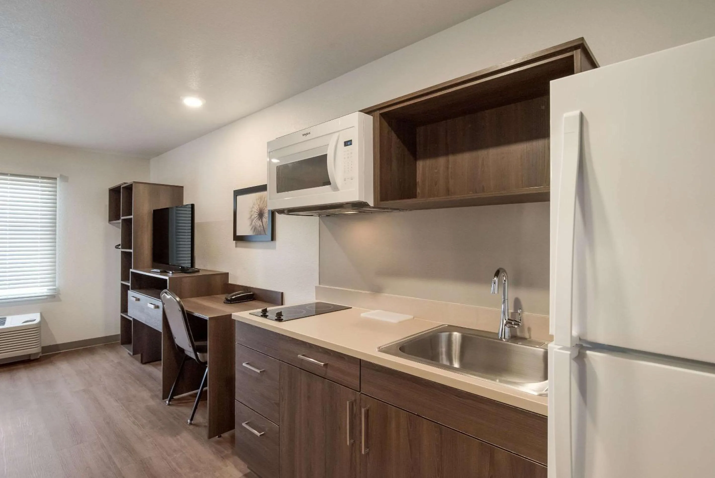 Bedroom in WoodSpring Suites Colorado Springs North - Air Force Academy