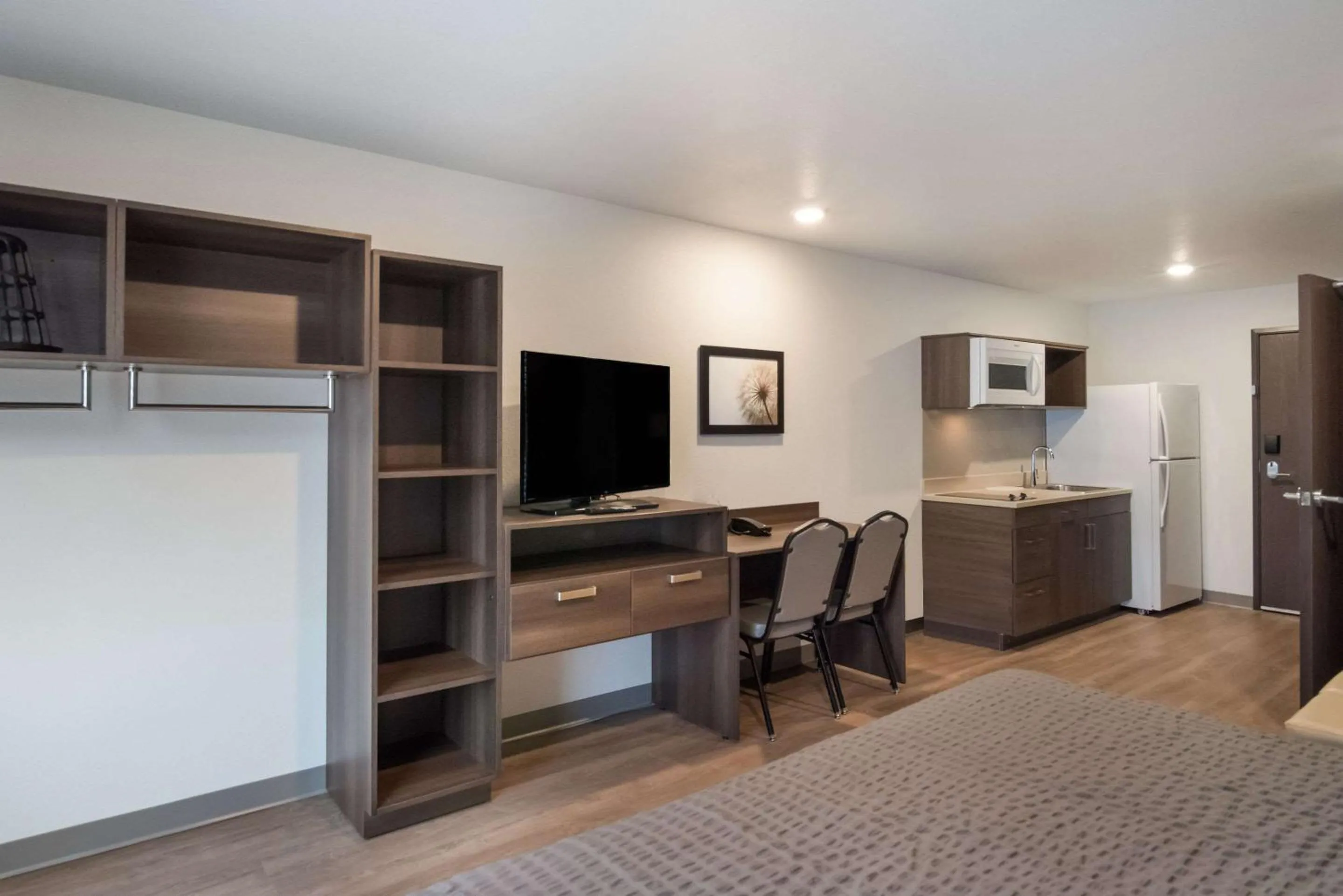 Bedroom in WoodSpring Suites Colorado Springs North - Air Force Academy